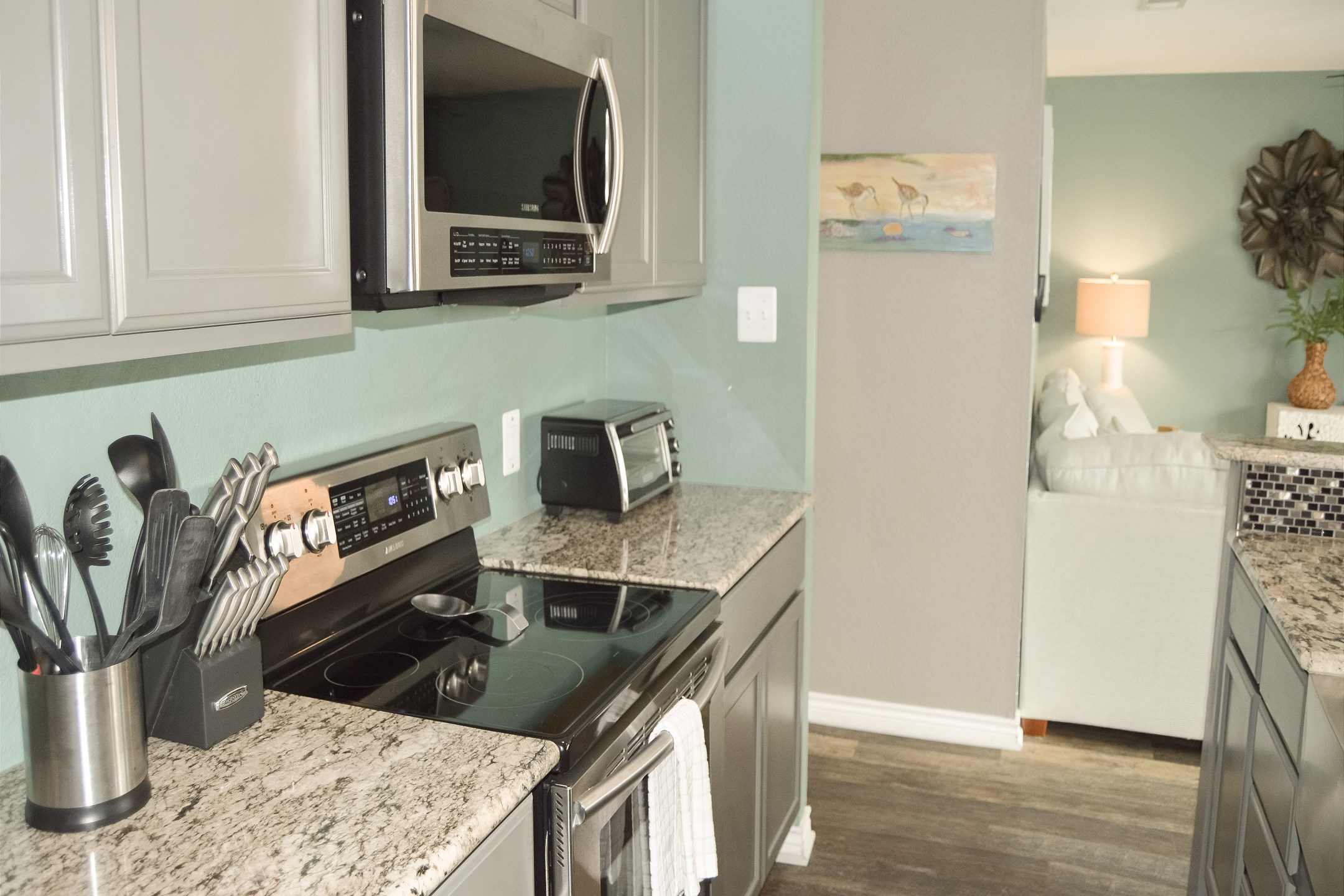 Kitchen area with stainless steel appliances and plenty of storage 