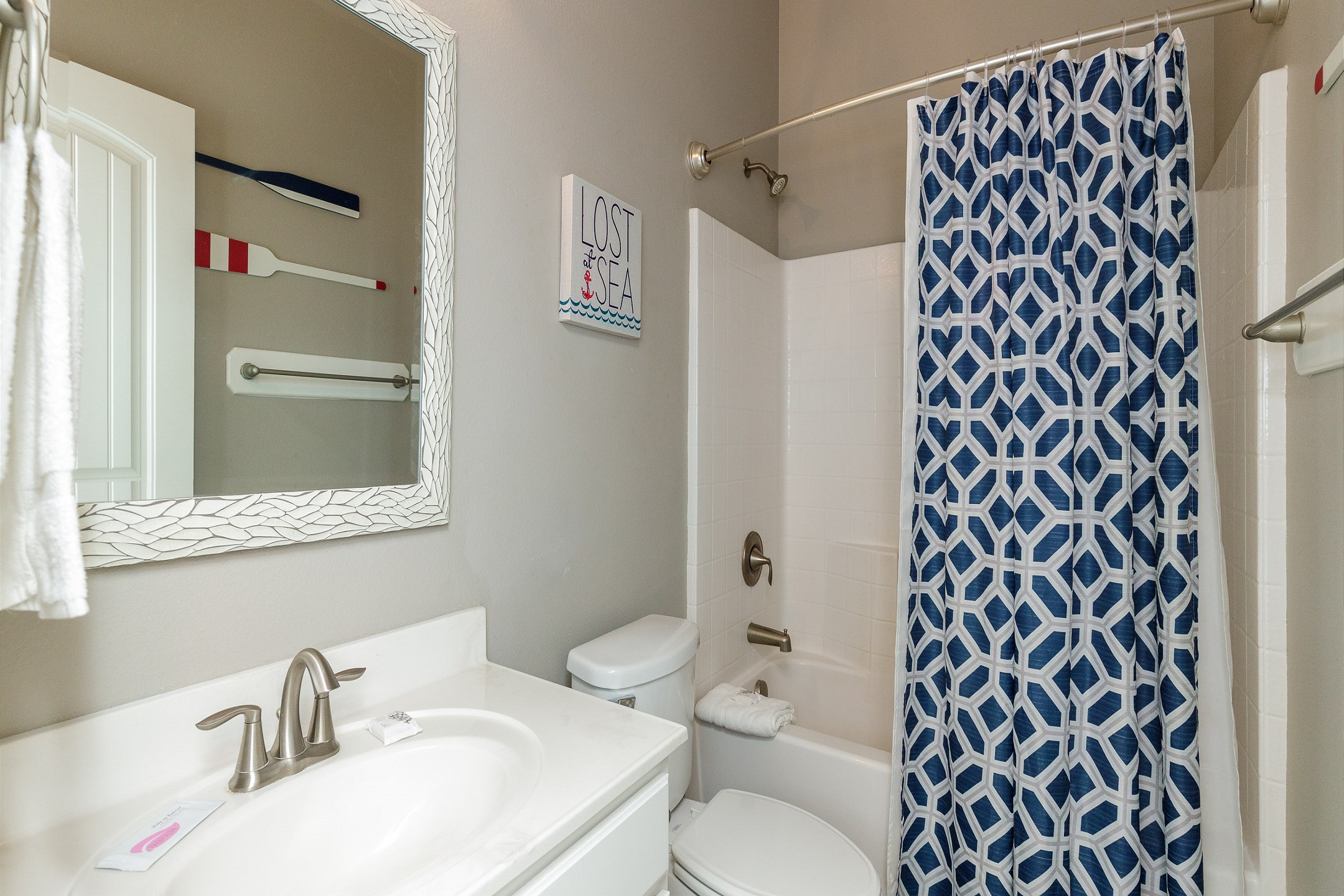 Guest bathroom with tub and shower