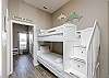 Twin size bunk beds in hallway