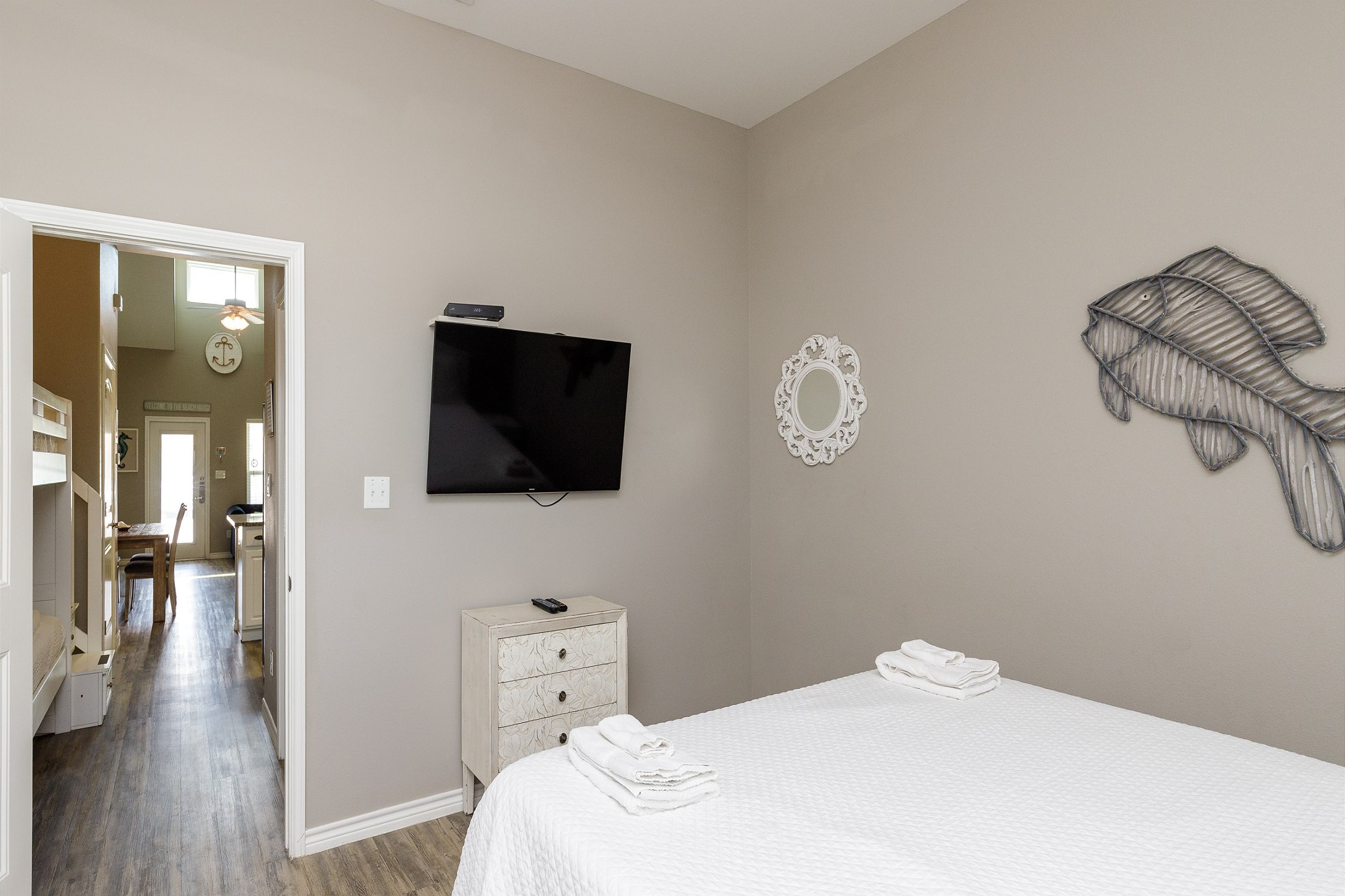 Master bedroom with a king size bed and flat screen TV