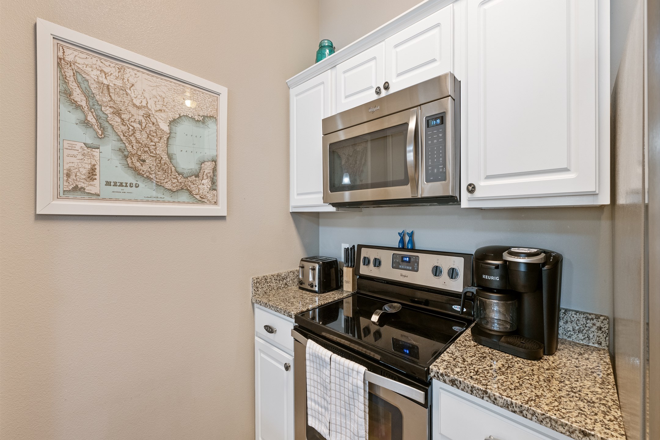 Fully equipped kitchen with stainless steel appliances 