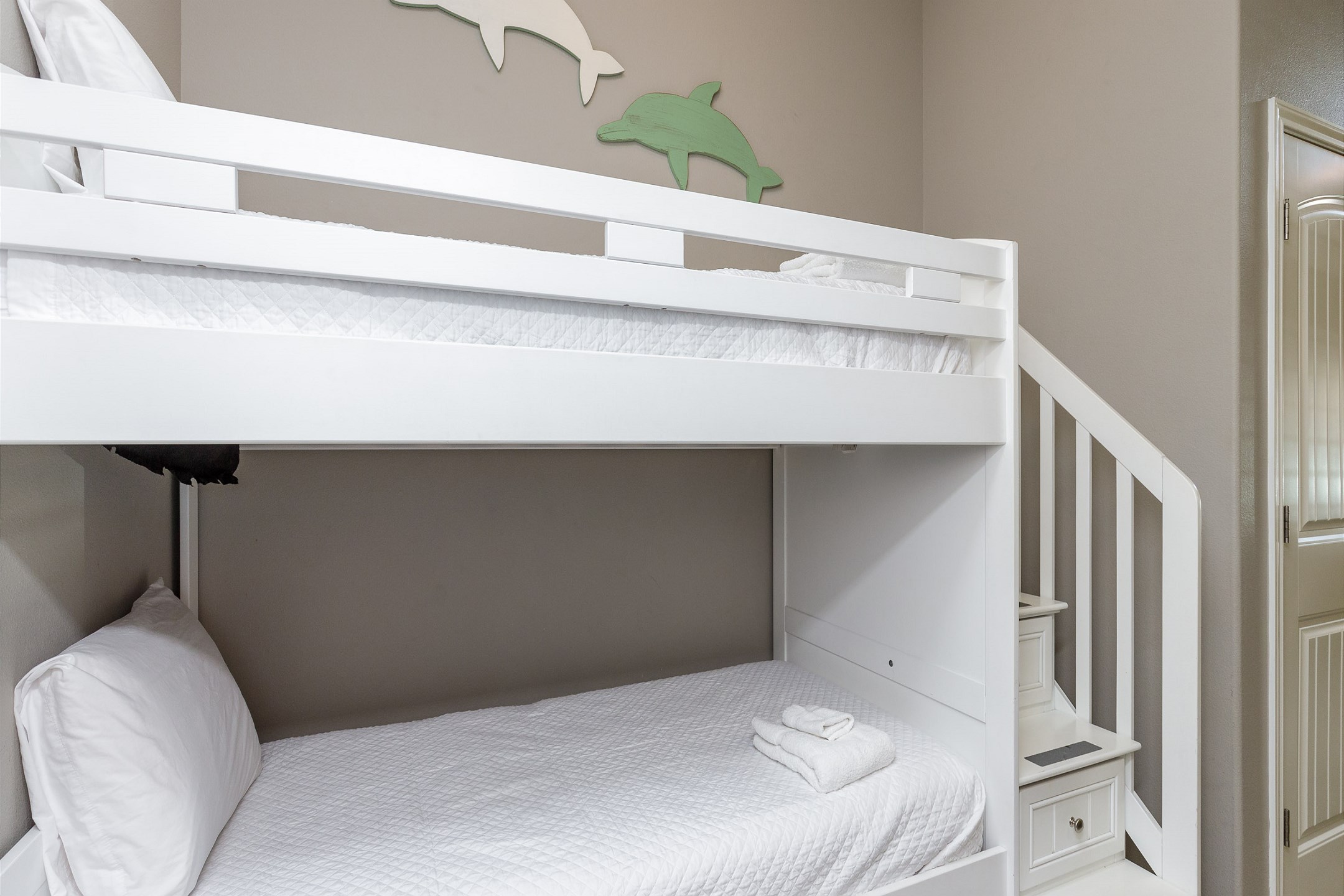 Twin size bunk beds off the hallway