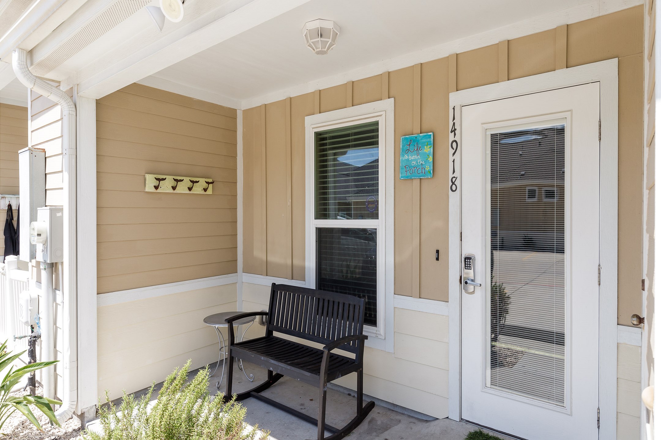 Two reserved parking spaces in front of your private patio and front door