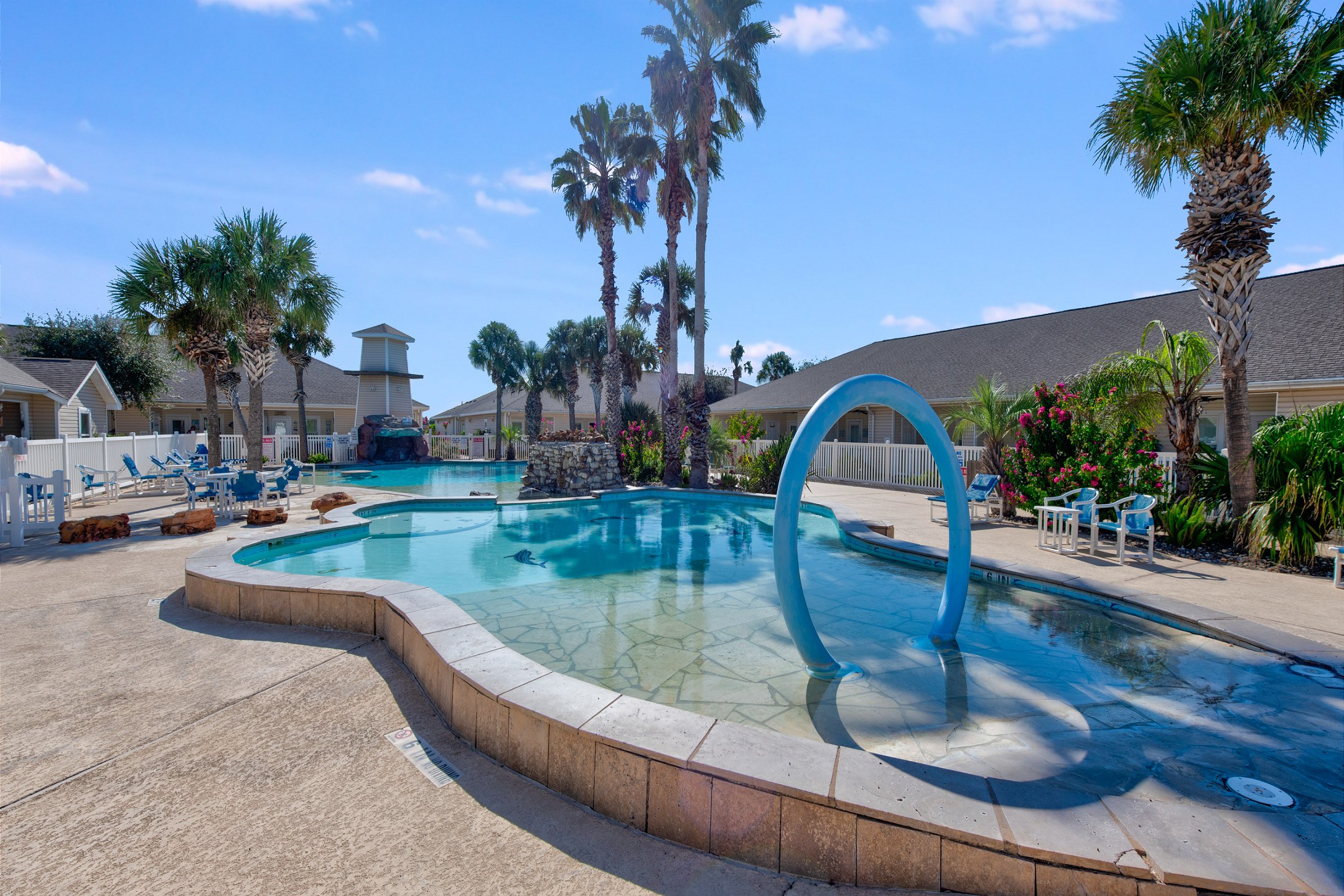 Inviting, serene pool offering a shallow and deep end for all ages
