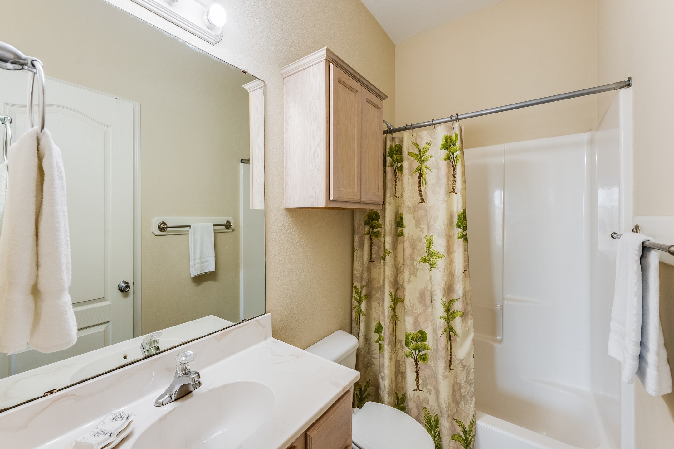 Guest bathroom on the second floor with tub and shower combo 
