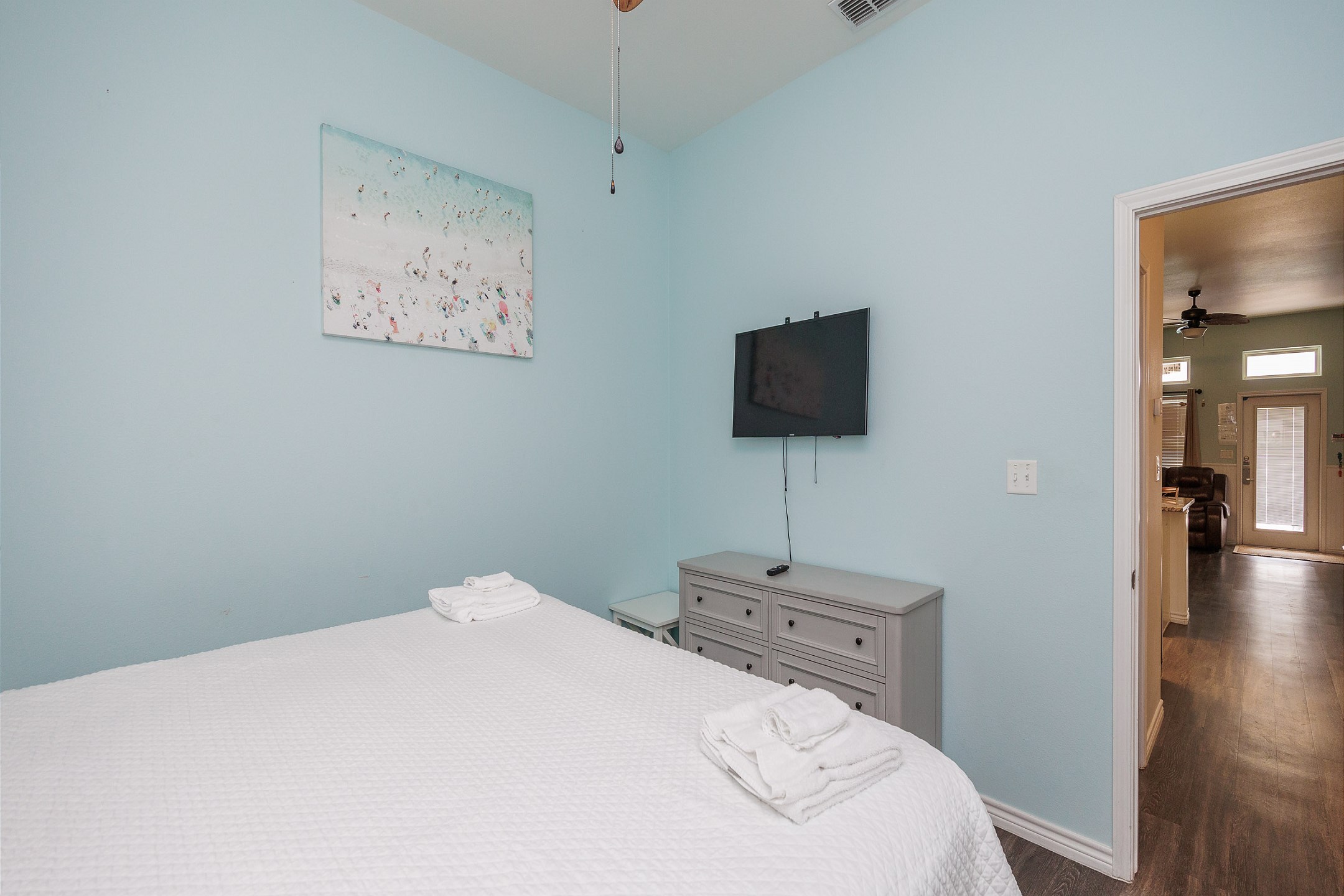 Master bedroom on the first floor with king size bed and flat screen TV