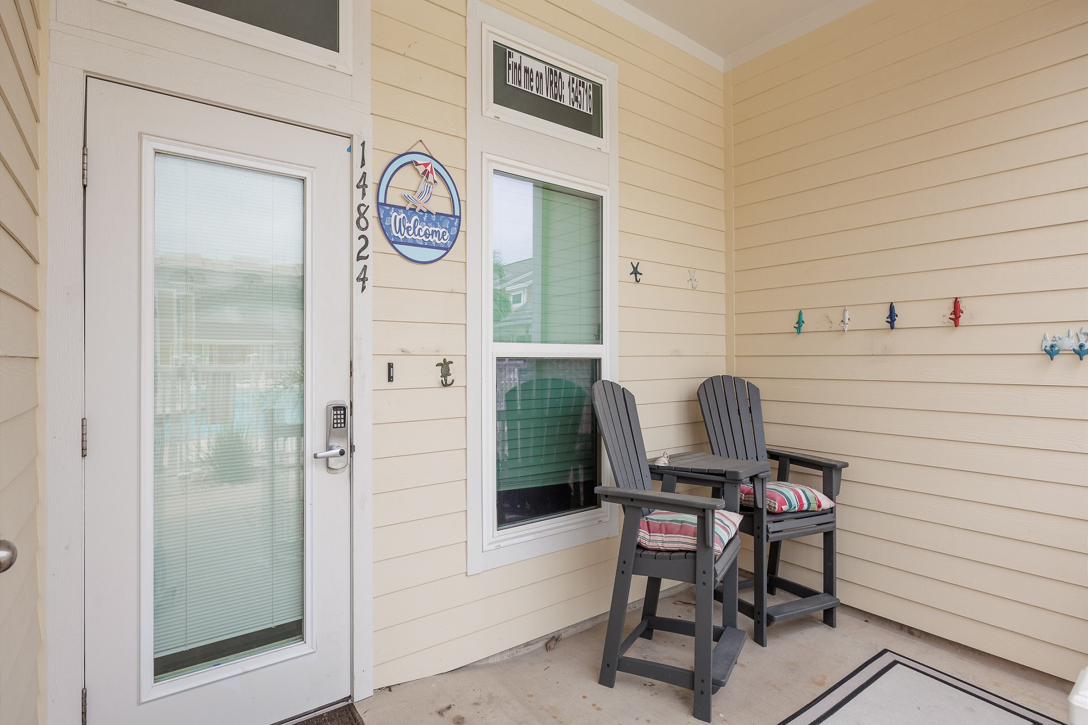 First floor patio and entryway with coded lock for added security 