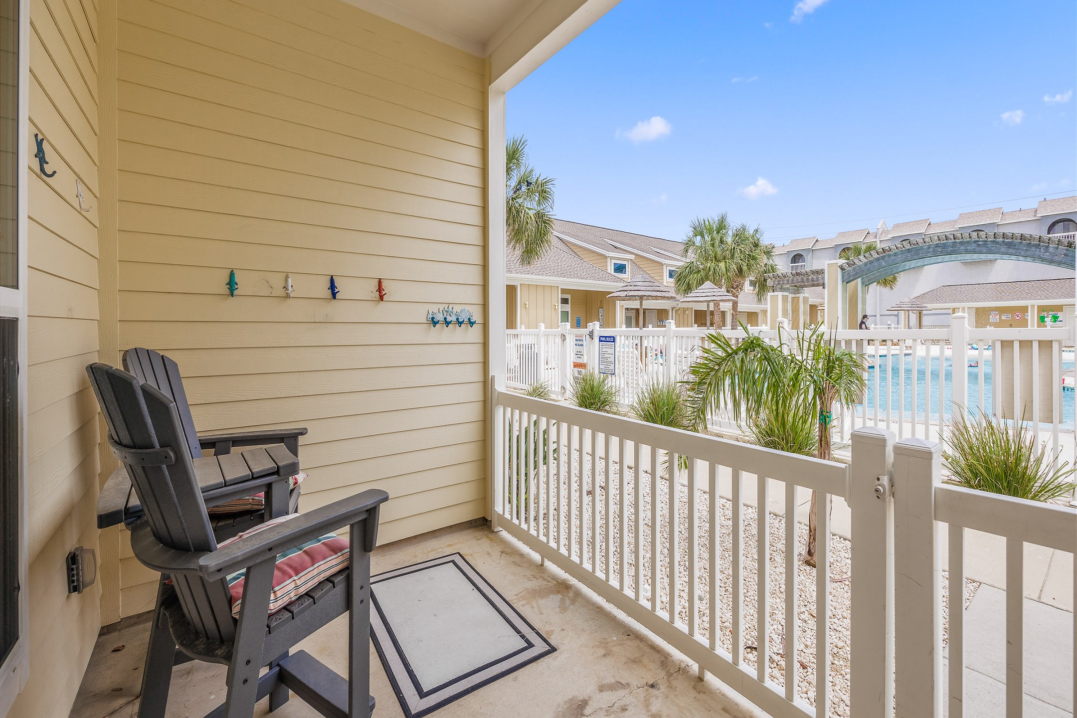 First floor patio with a pool view to enjoy the Texas breeze with your favorite beverage