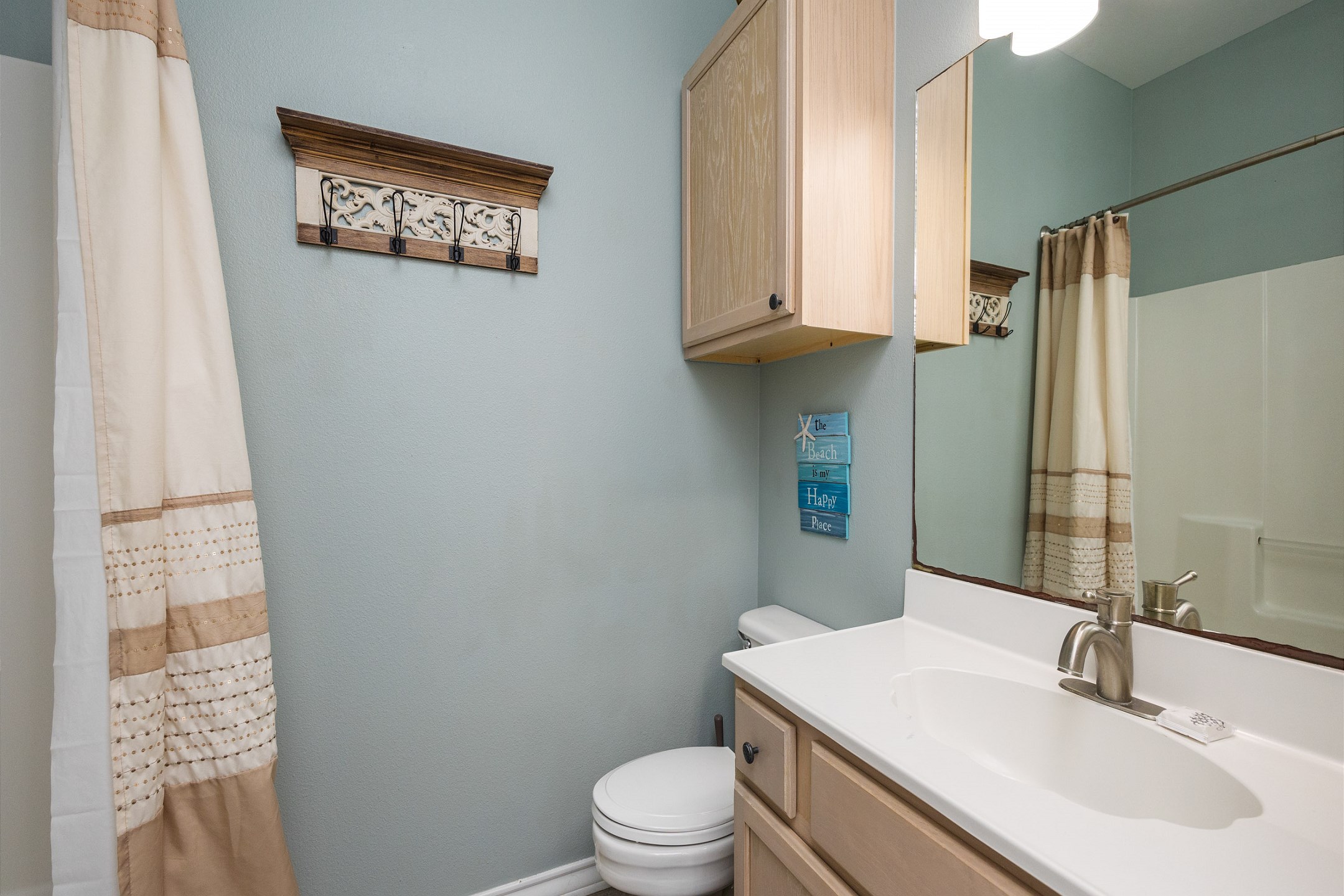 Guest bathroom on the second floor with tub/shower combo
