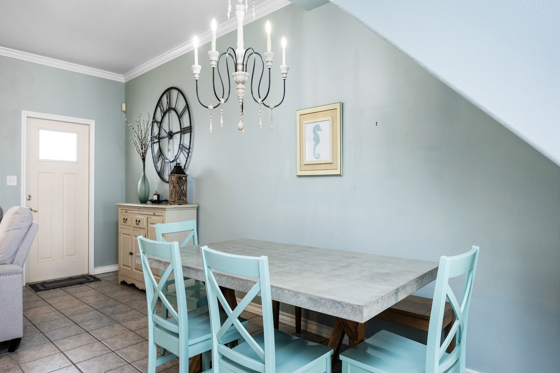 Dining table with seating for four and a bench