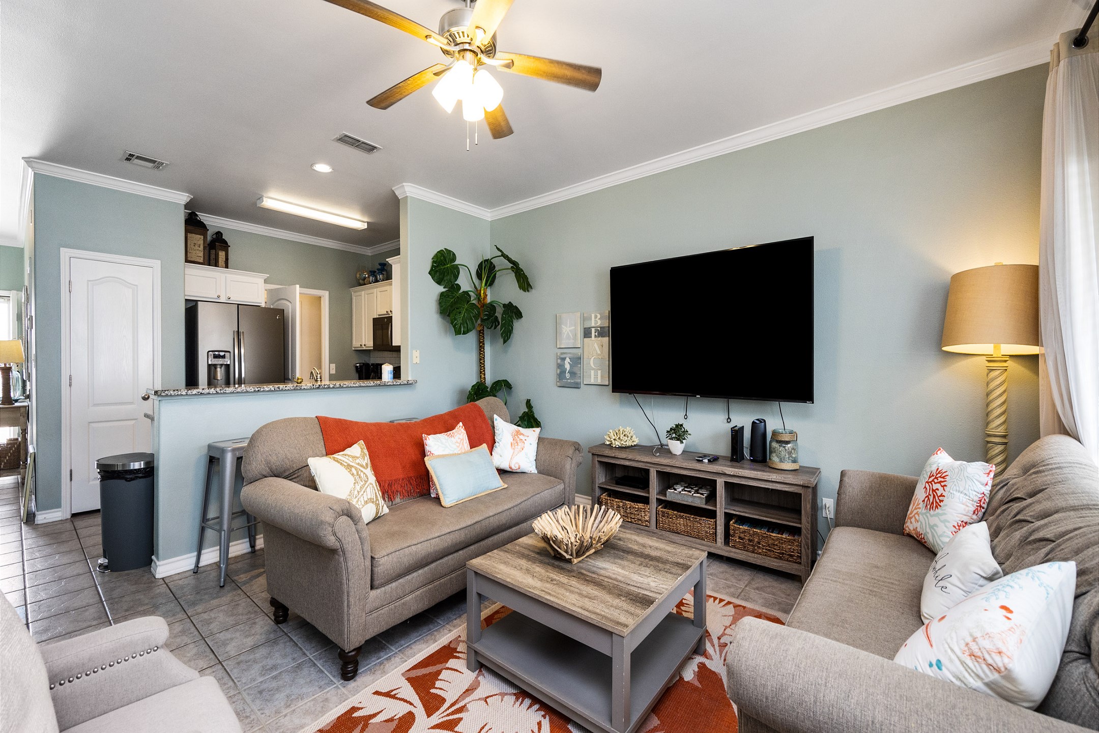 Cozy living space with flat screen TV and comfortable furniture to relax with the family