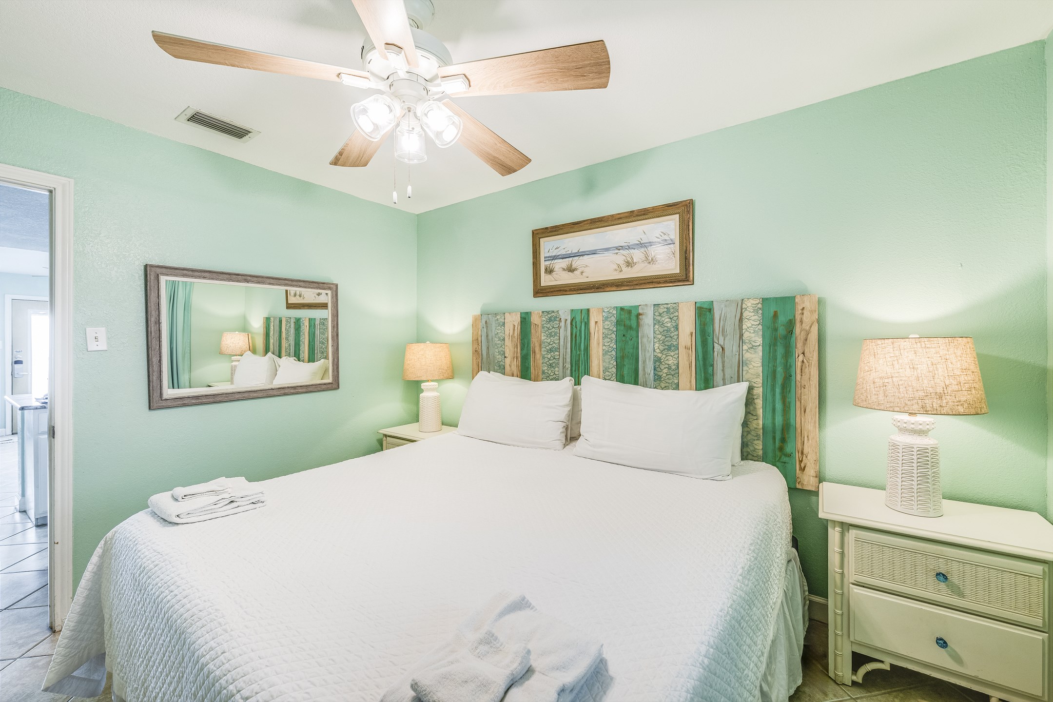 Master bedroom with king size bed with flat screen TV