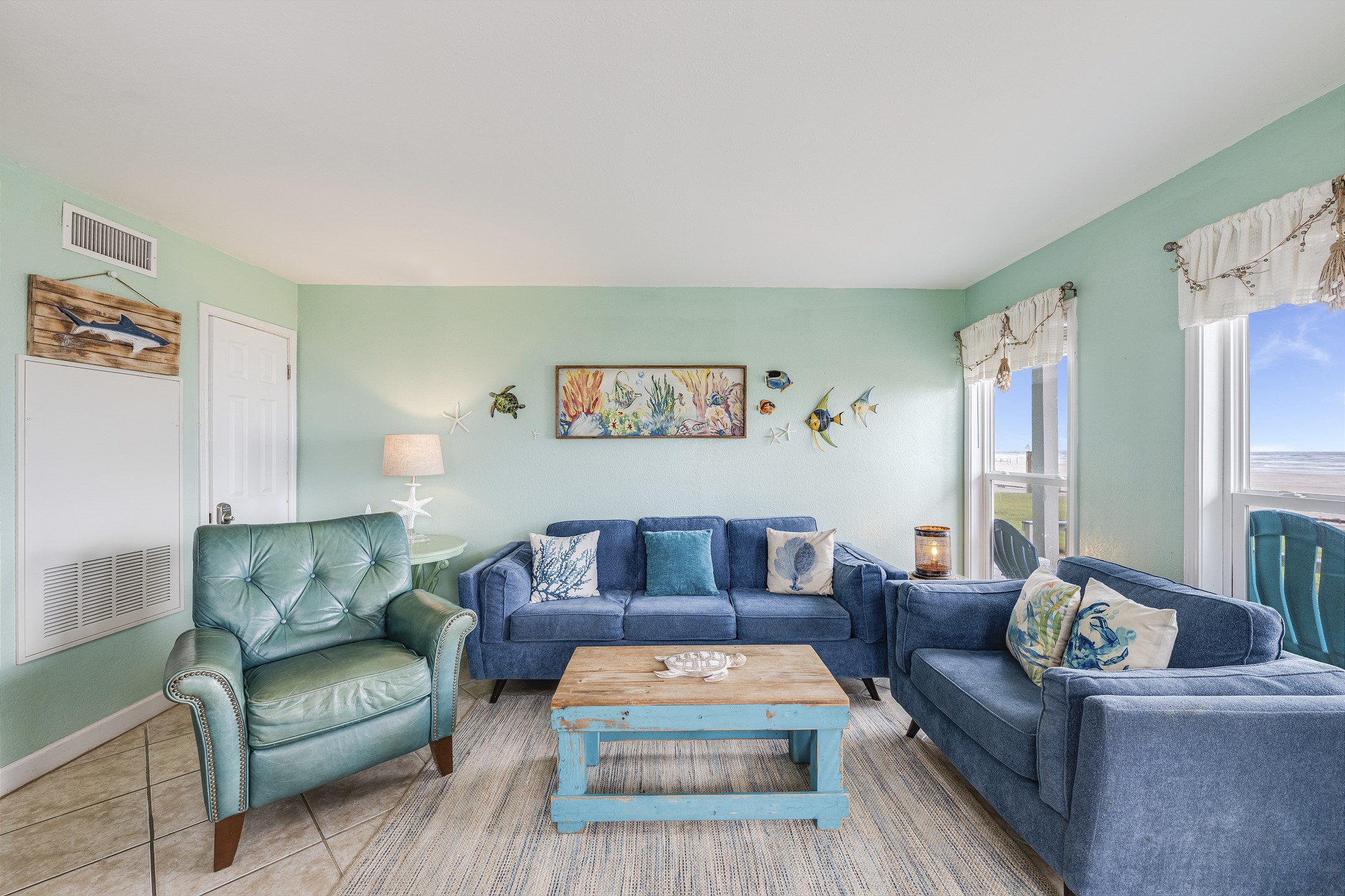 Modern coastal retreat with airy design and entertainment-ready living area