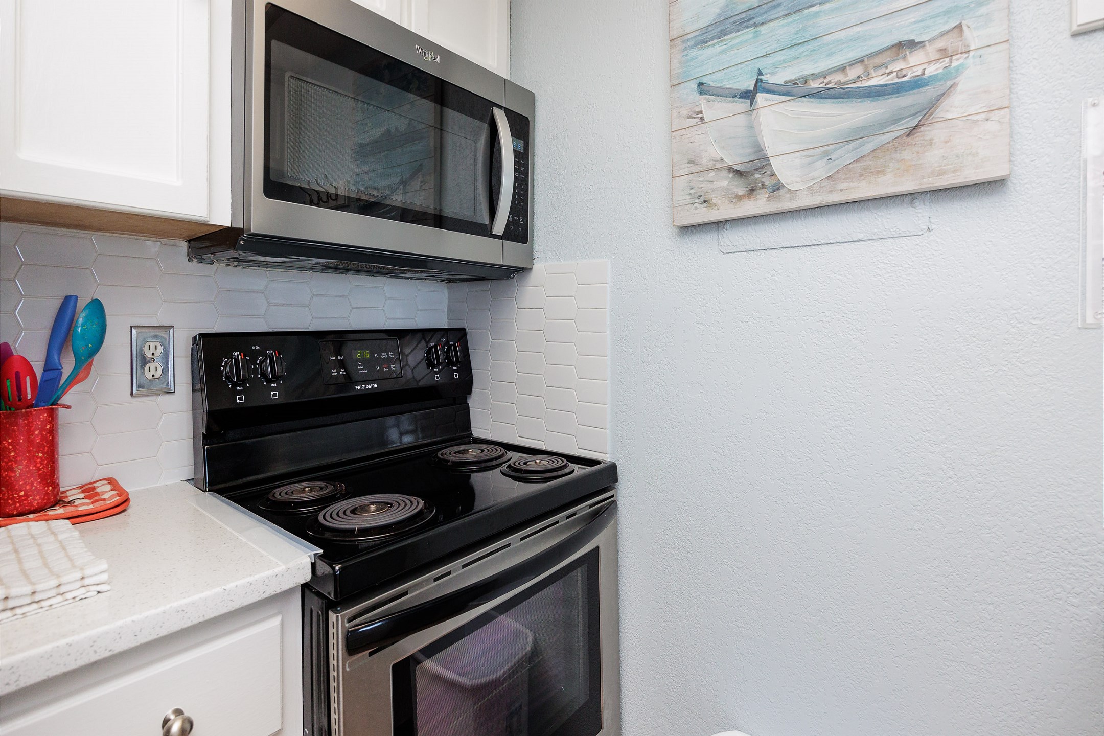 Well-equipped kitchen with stainless steel appliances 