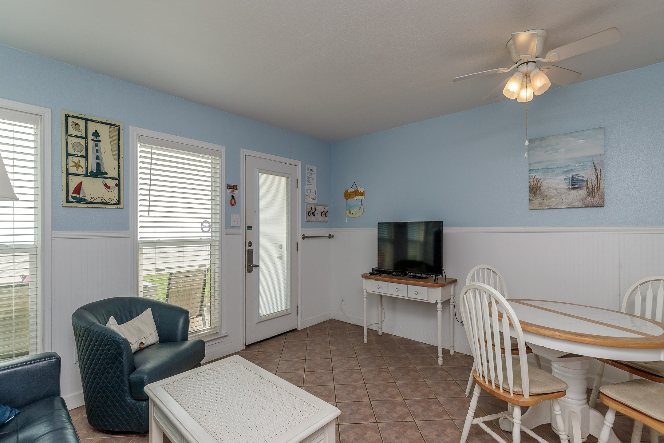Updated living area with an amazing view of the beach right out front