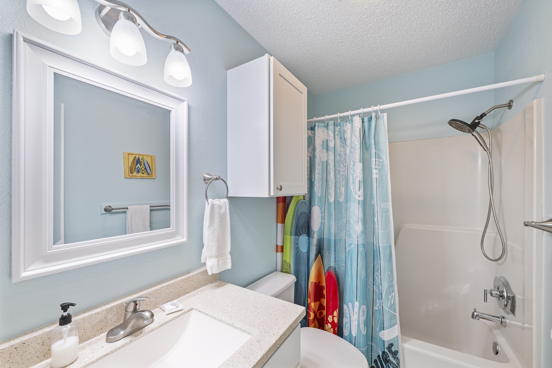 Guest bathroom on the second floor with tub and shower combo