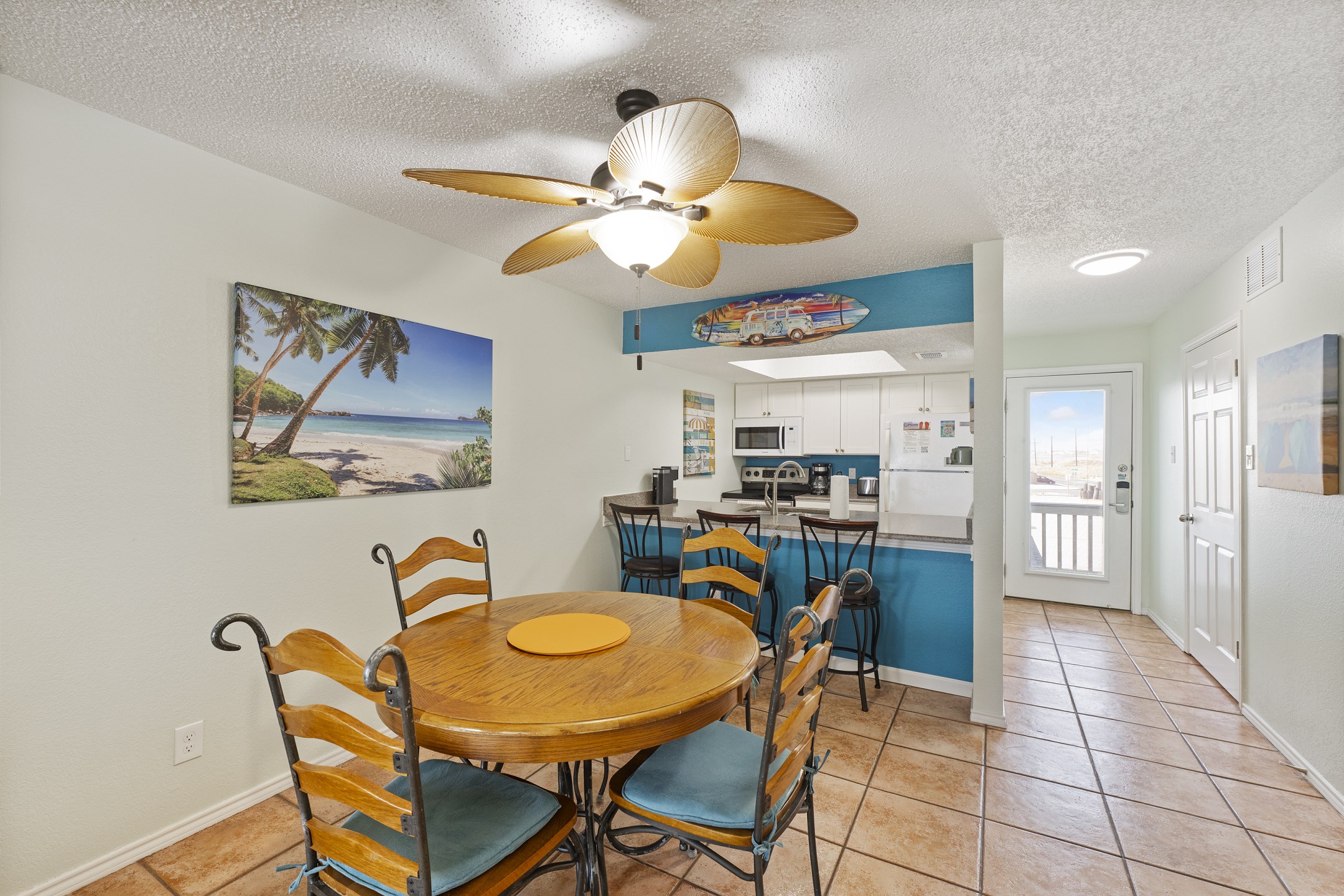 Bright and newly updated dining space adjacent to the kitchen for easy vacation gatherings