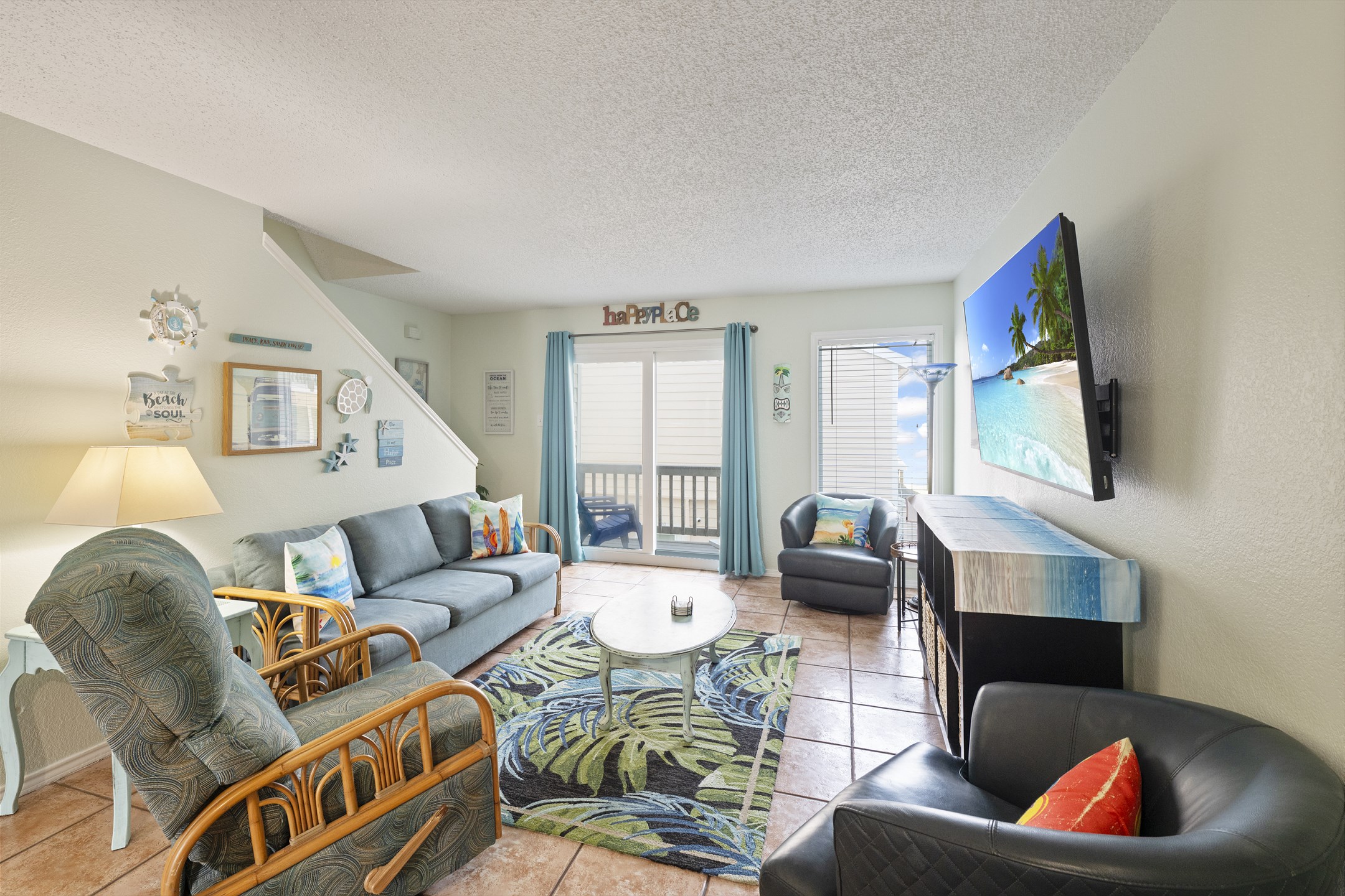 Stylish living room with cozy furniture and lovely coastal decor – perfect space to gather with the family 