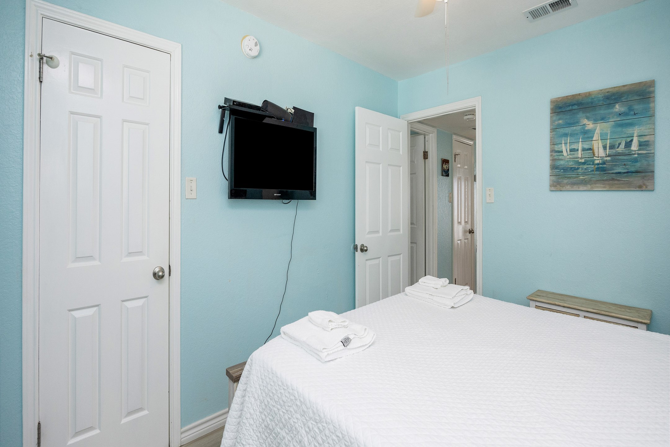 Master bedroom with queen size bed and flat screen TV