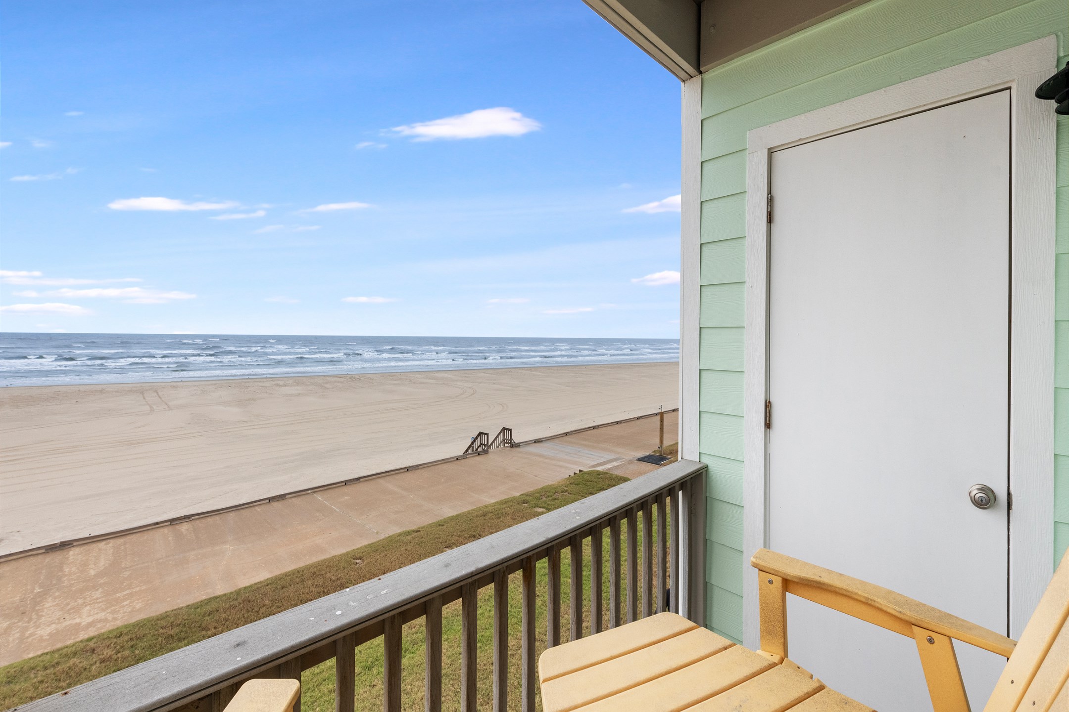 Private balcony off the living area with beautiful beachfront views