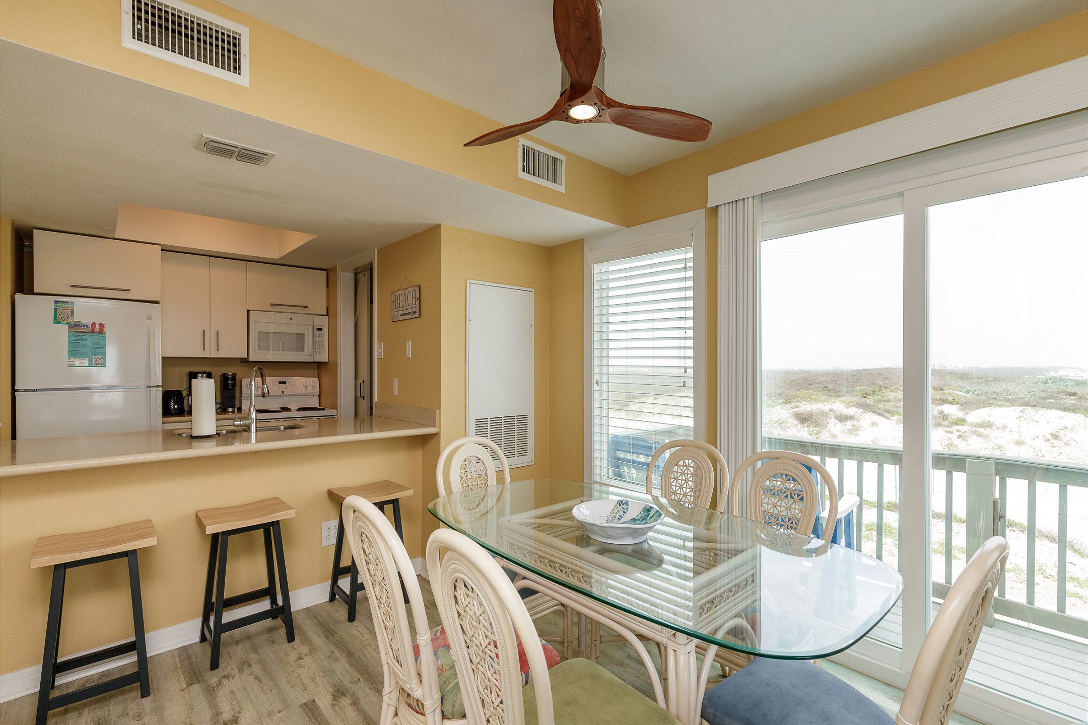 Open concept dining and kitchen area with the best view on the island