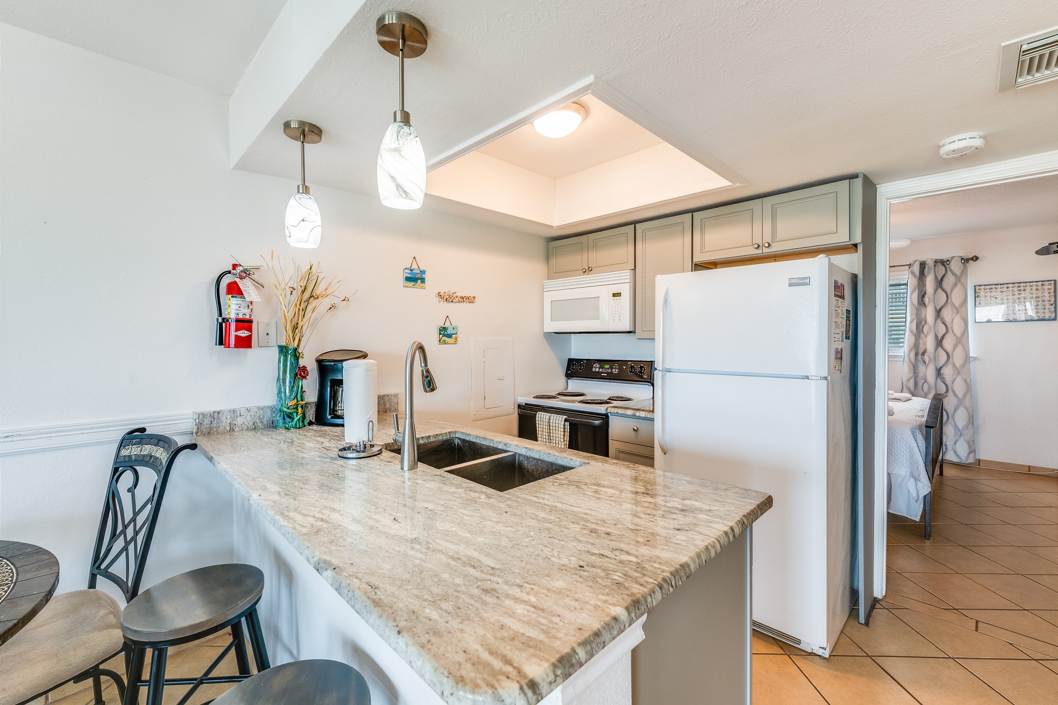Kitchen area with 12-cup coffee maker and beautiful features throughout 