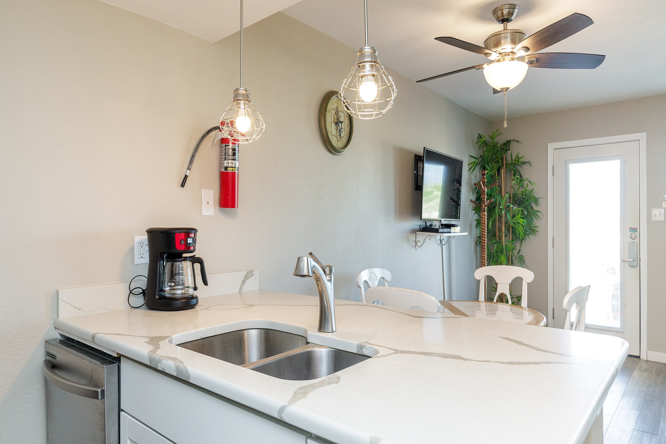 Open layout connecting the kitchen to the living and dining areas