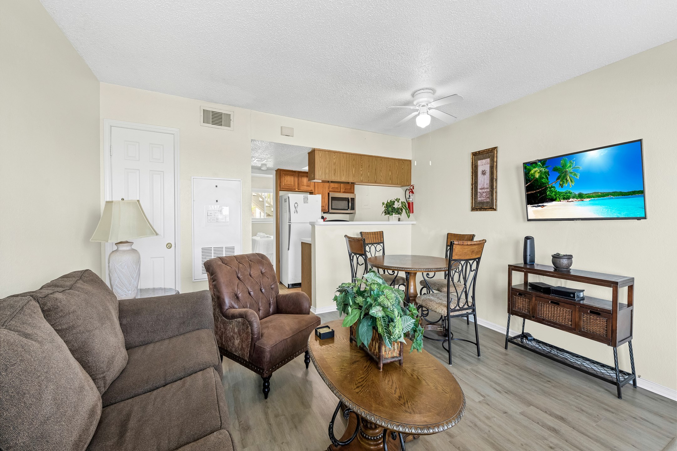 Warm and welcoming open concept design ideal for relaxing, cooking, and sharing meals