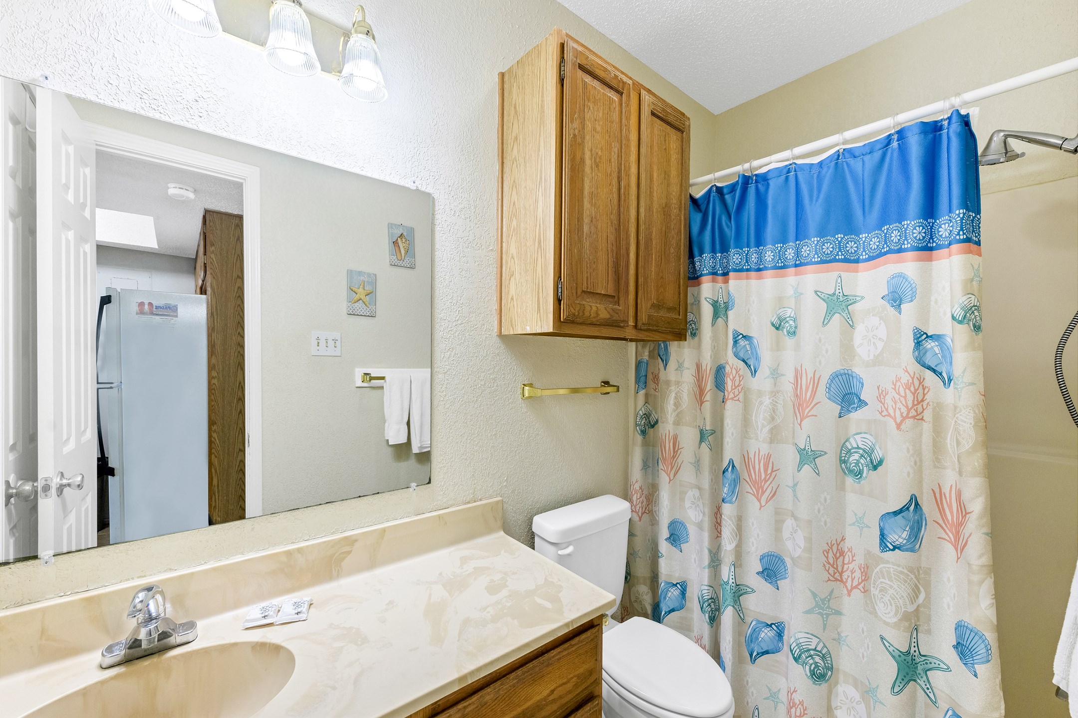 Guest bathroom with tub and shower combo