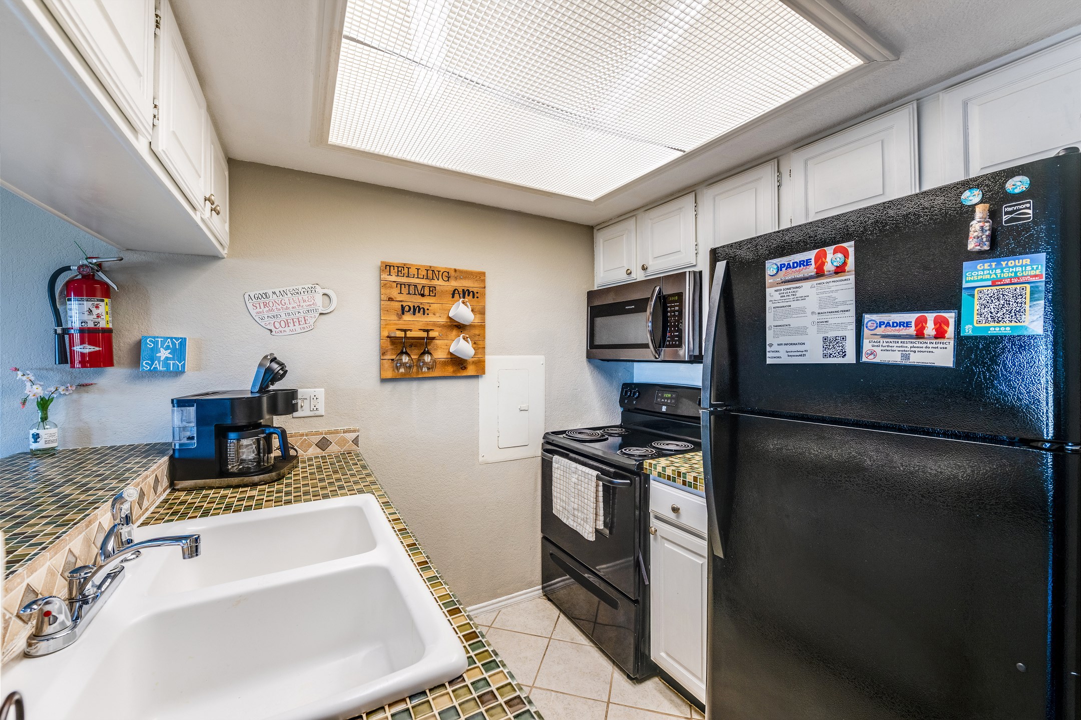 Fully equipped kitchen with coffee maker, toaster, and other essentials provided for your vacation needs