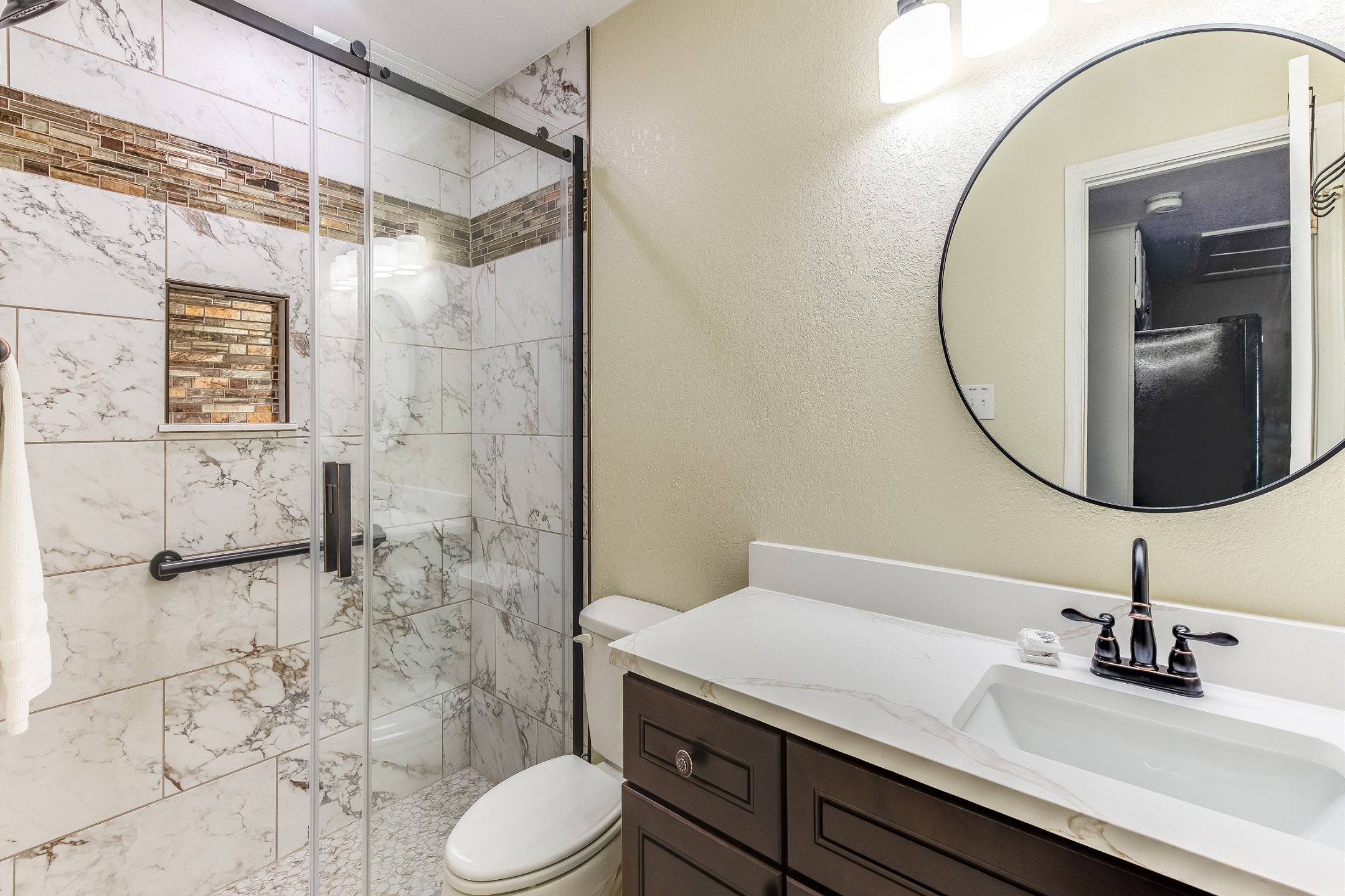 Remodeled guest bathroom with beautiful walk in shower