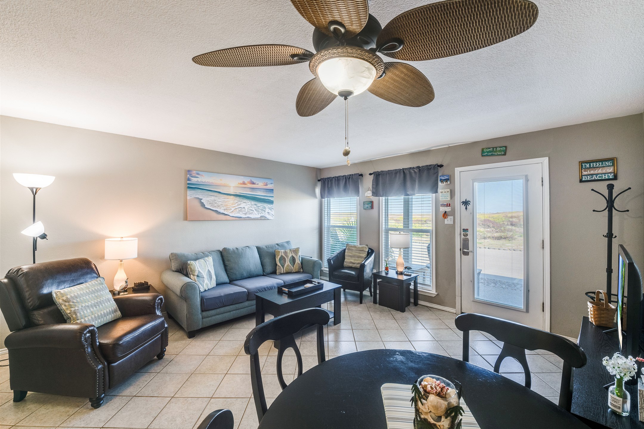 Enjoy the natural light shinning through the windows while relaxing on the comfortable furniture and taking in the breeze of the beach