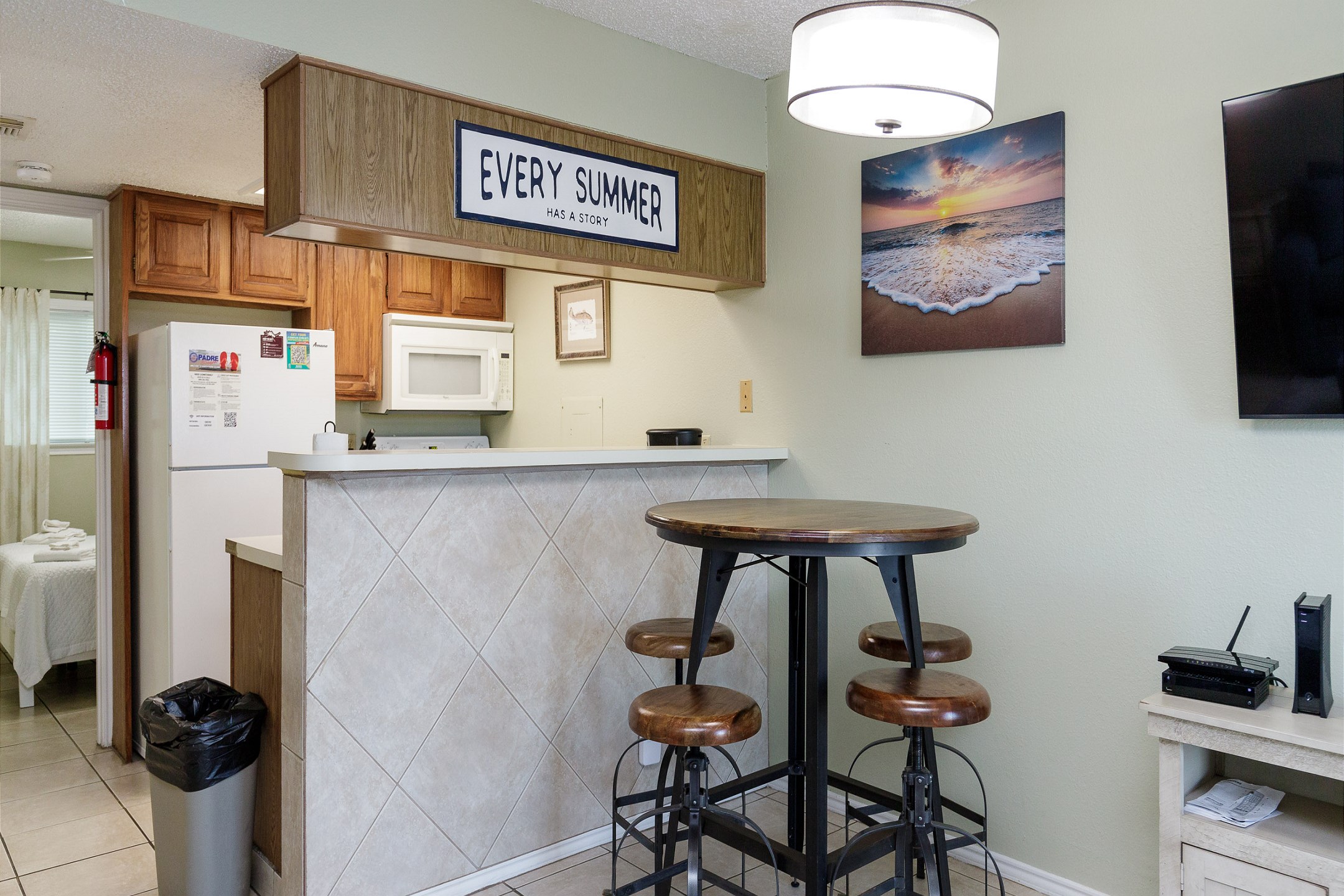 Open-concept layout connecting the dining area to the kitchen