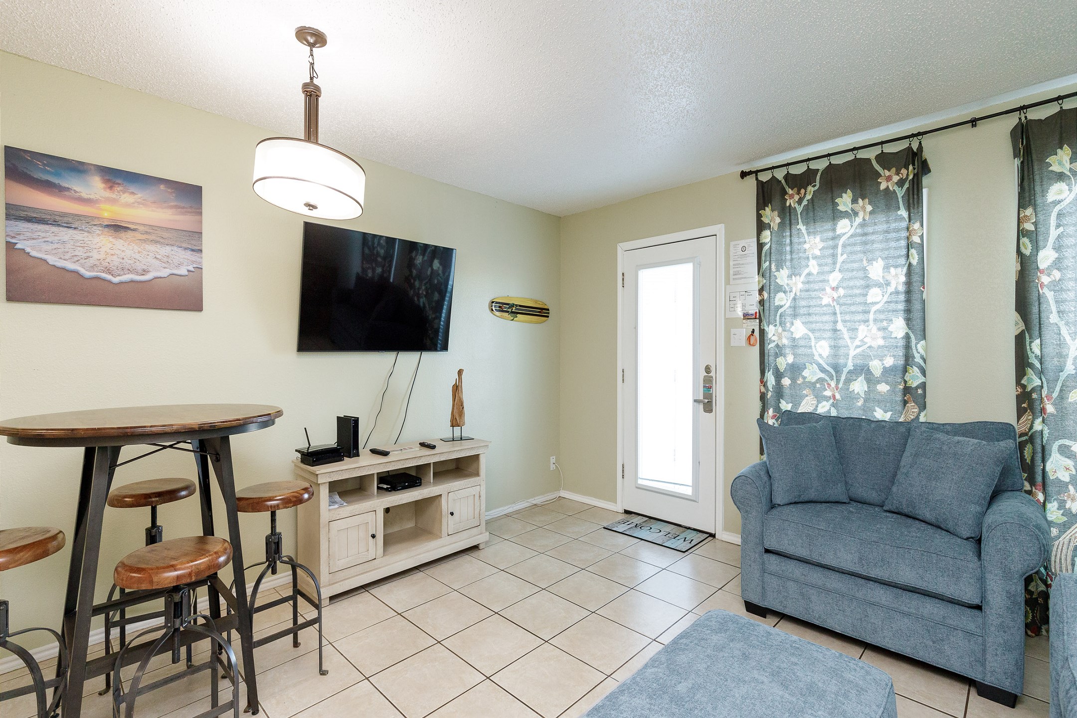 Comfortable living space with new furniture and flat screen TV to enjoy 