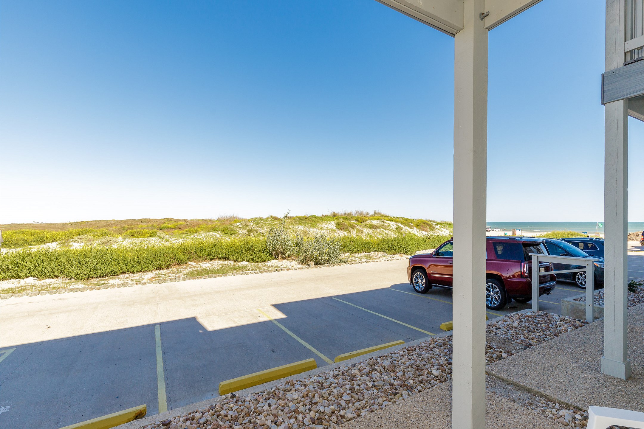 Unwind on the patio, where the sounds of the waves lead you just steps away to the beach