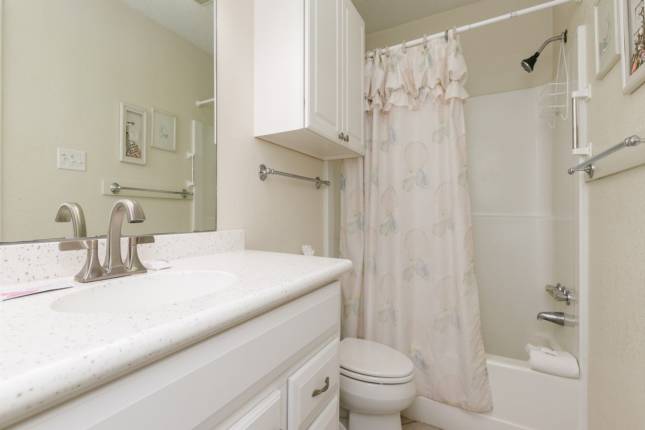 Guest bathroom with tub and shower 