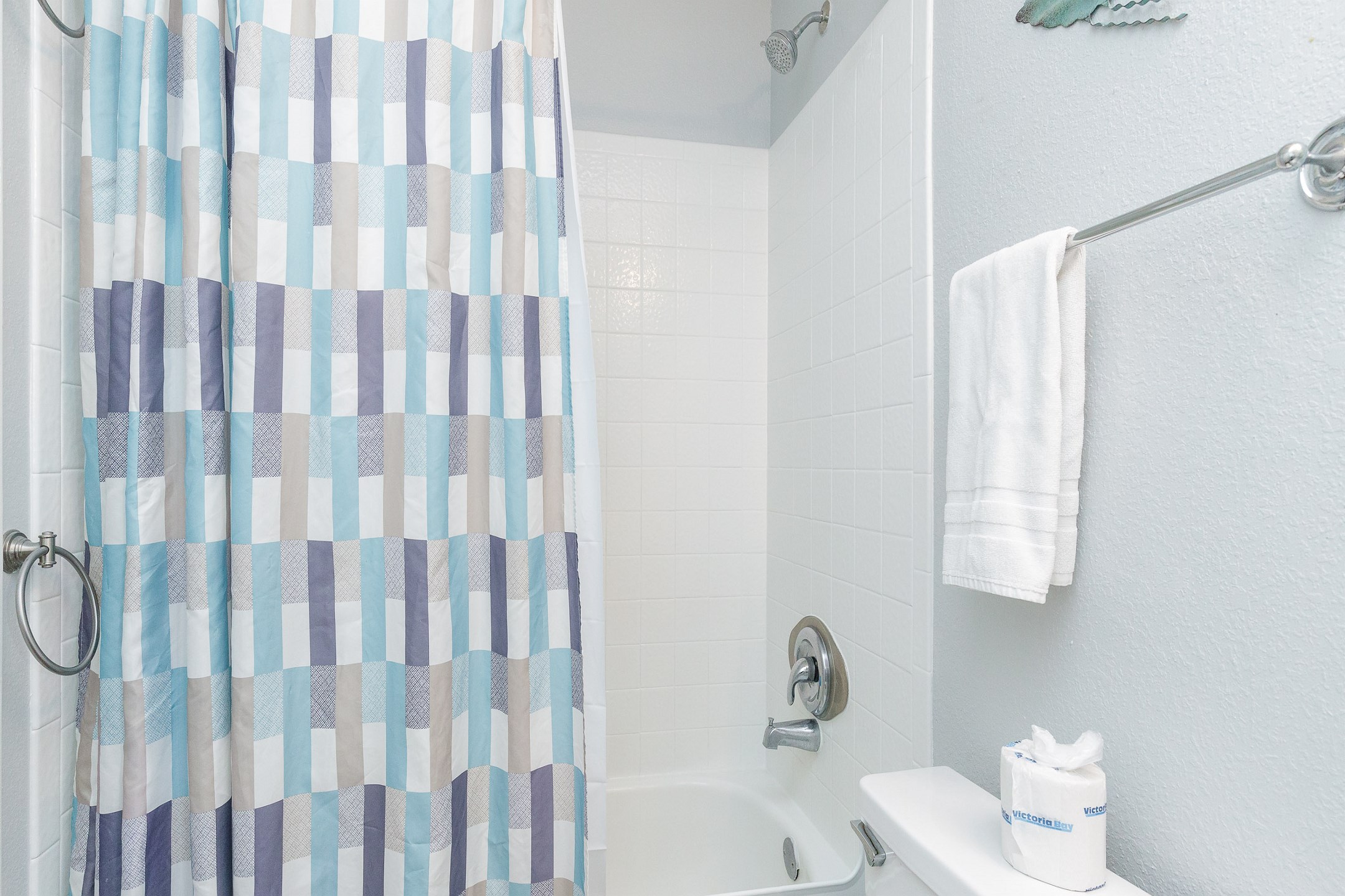 Guest bathroom with tub and shower 