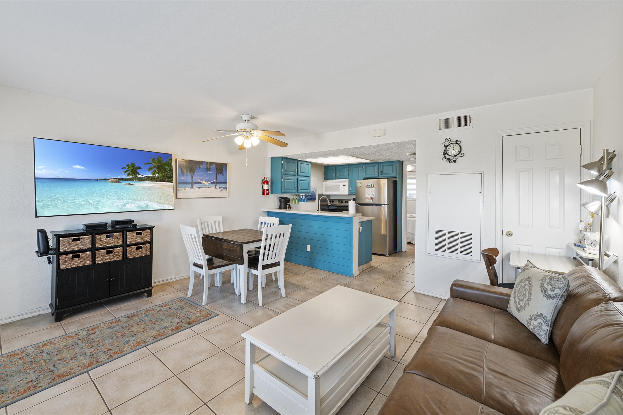 Open-concept layout connecting the dining area to the kitchen