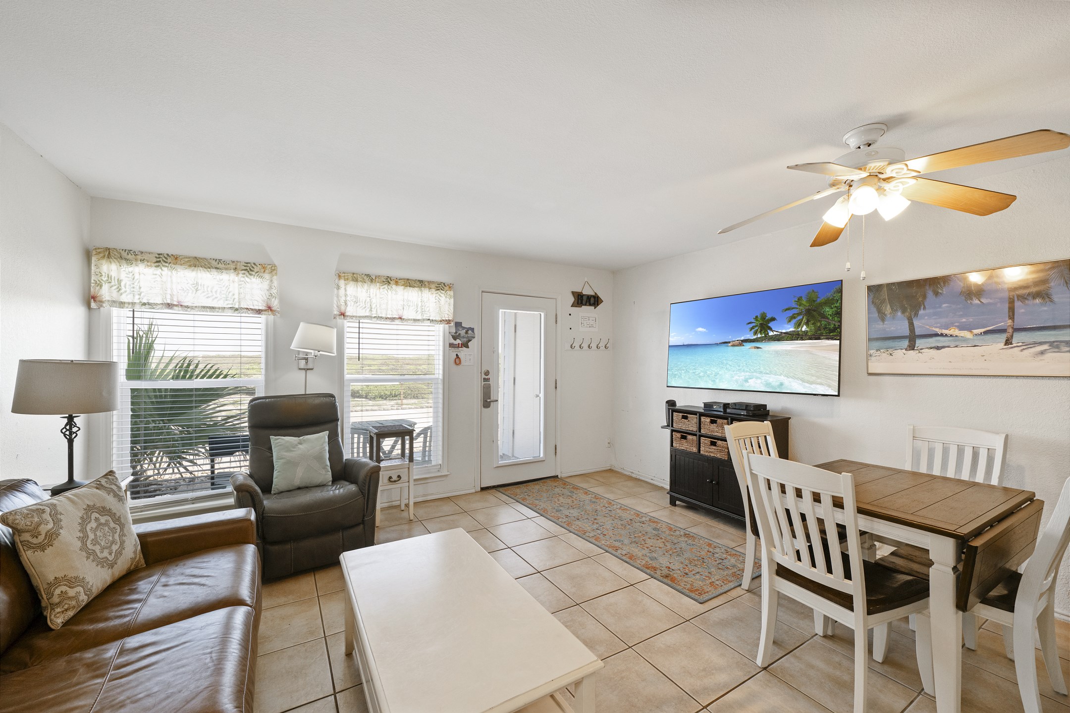 Open concept living area, kitchen, and dining area 
