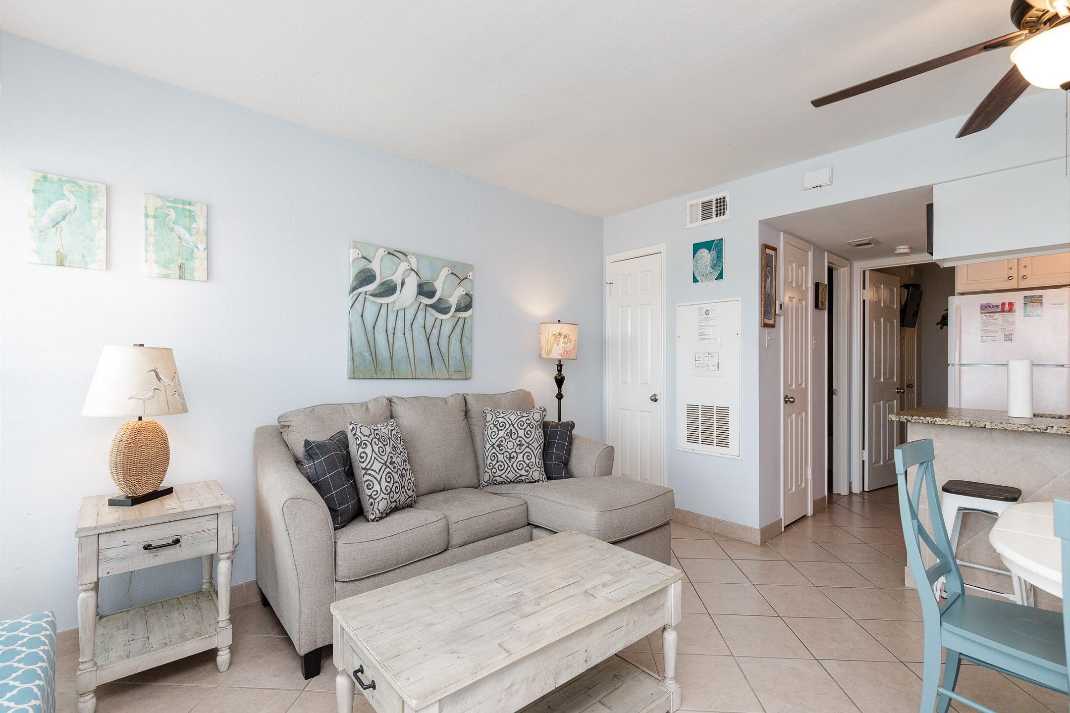 Updated living space with new cozy sofa with a chaise for relaxing