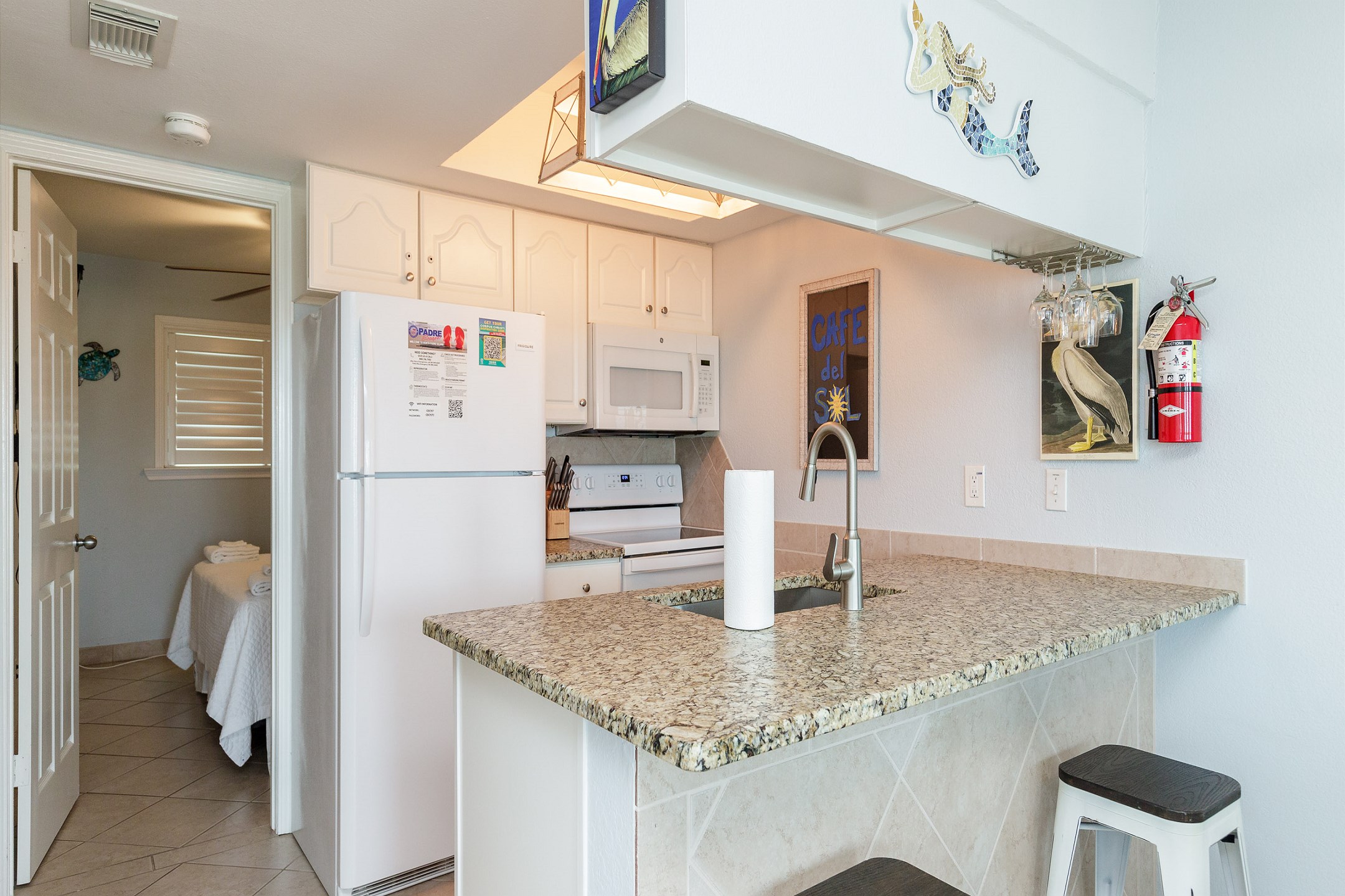Breakfast bar with seating for two off the kitchen area 