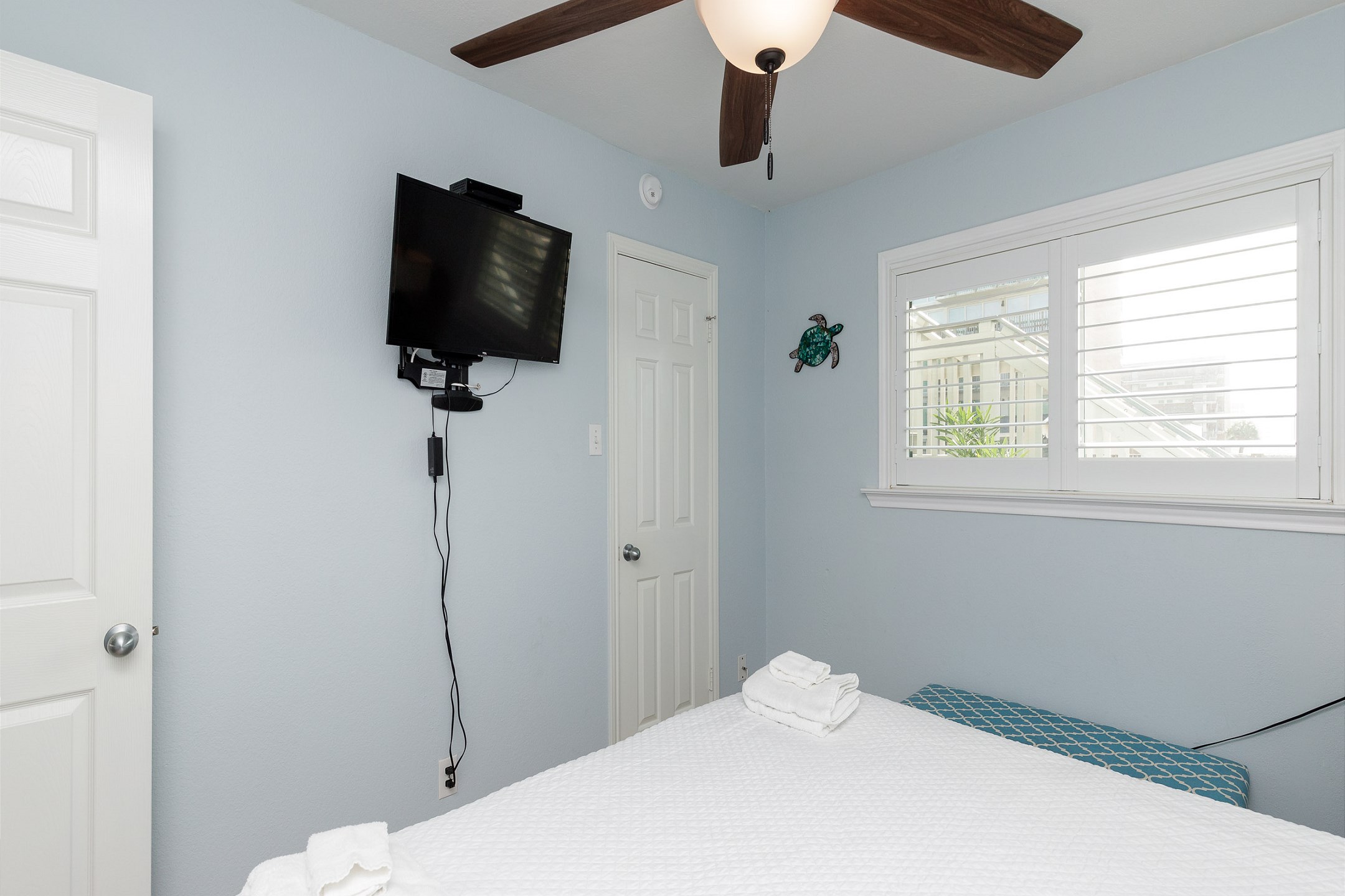 Master bedroom with king size bed and flat screen TV