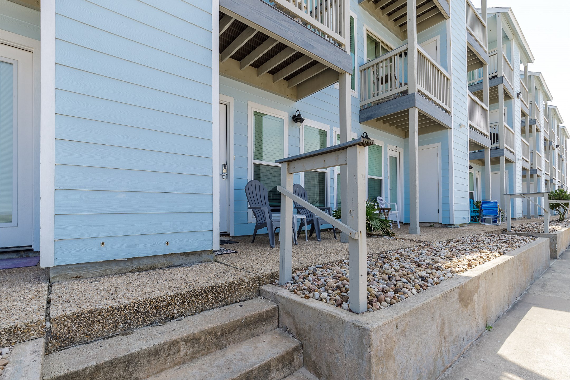 The front patio is only steps away from the beach