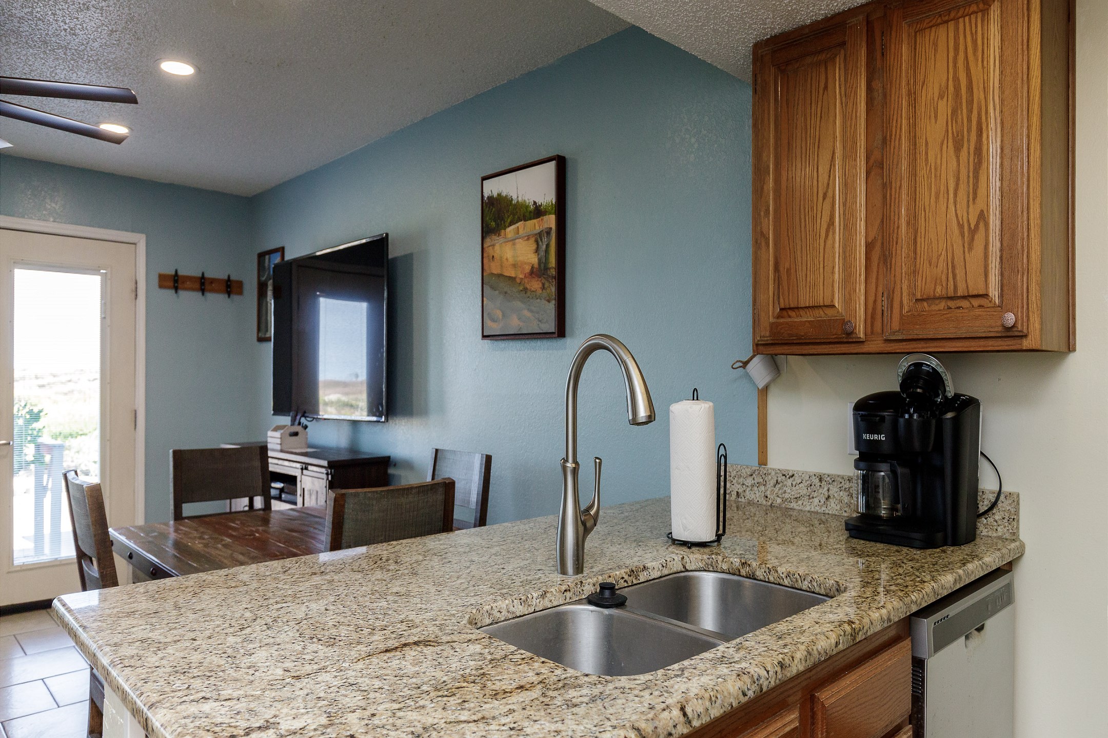Modern kitchen with stainless steel appliances