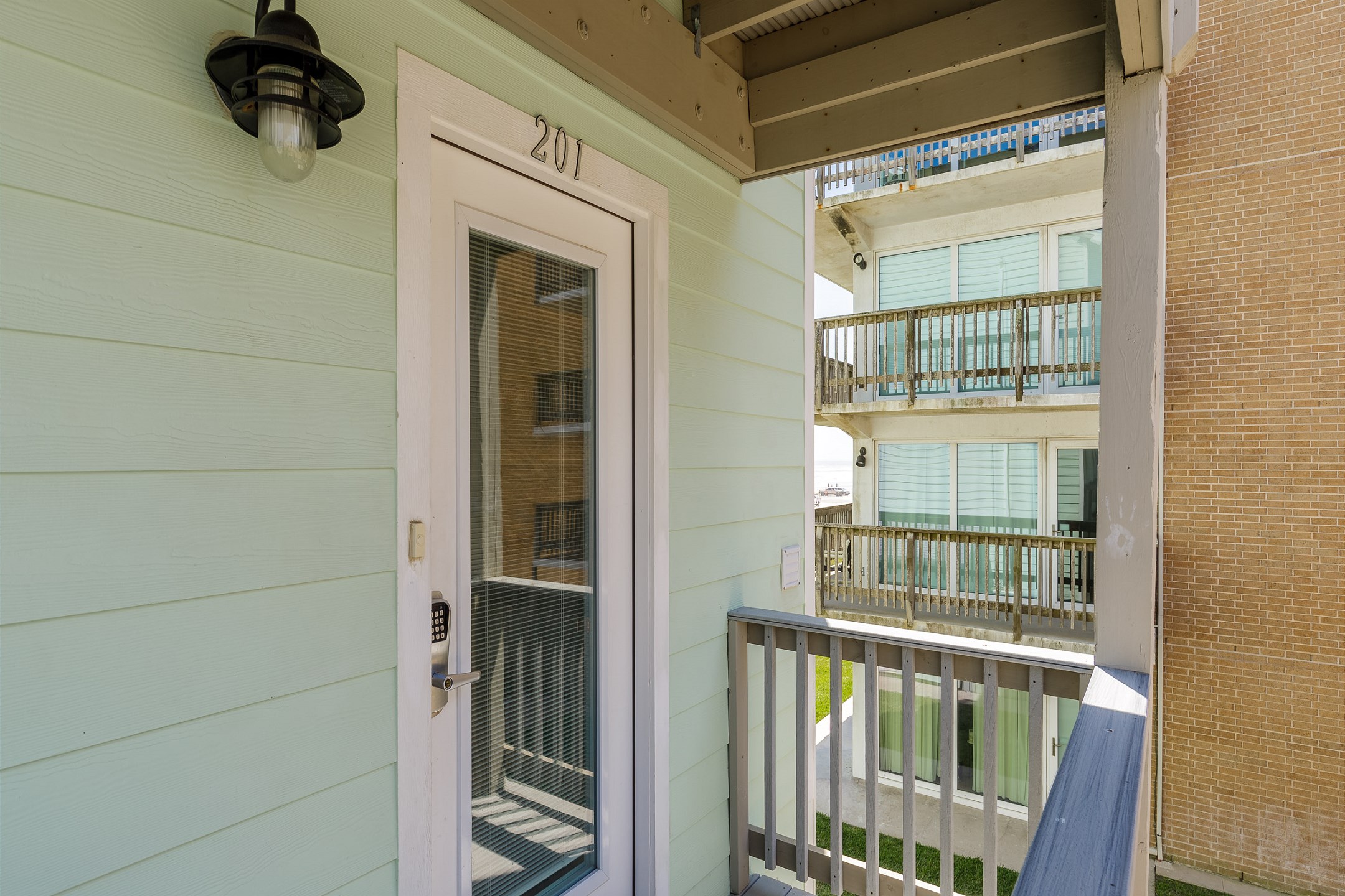 Front entrance on the second floor with coded lock for added security