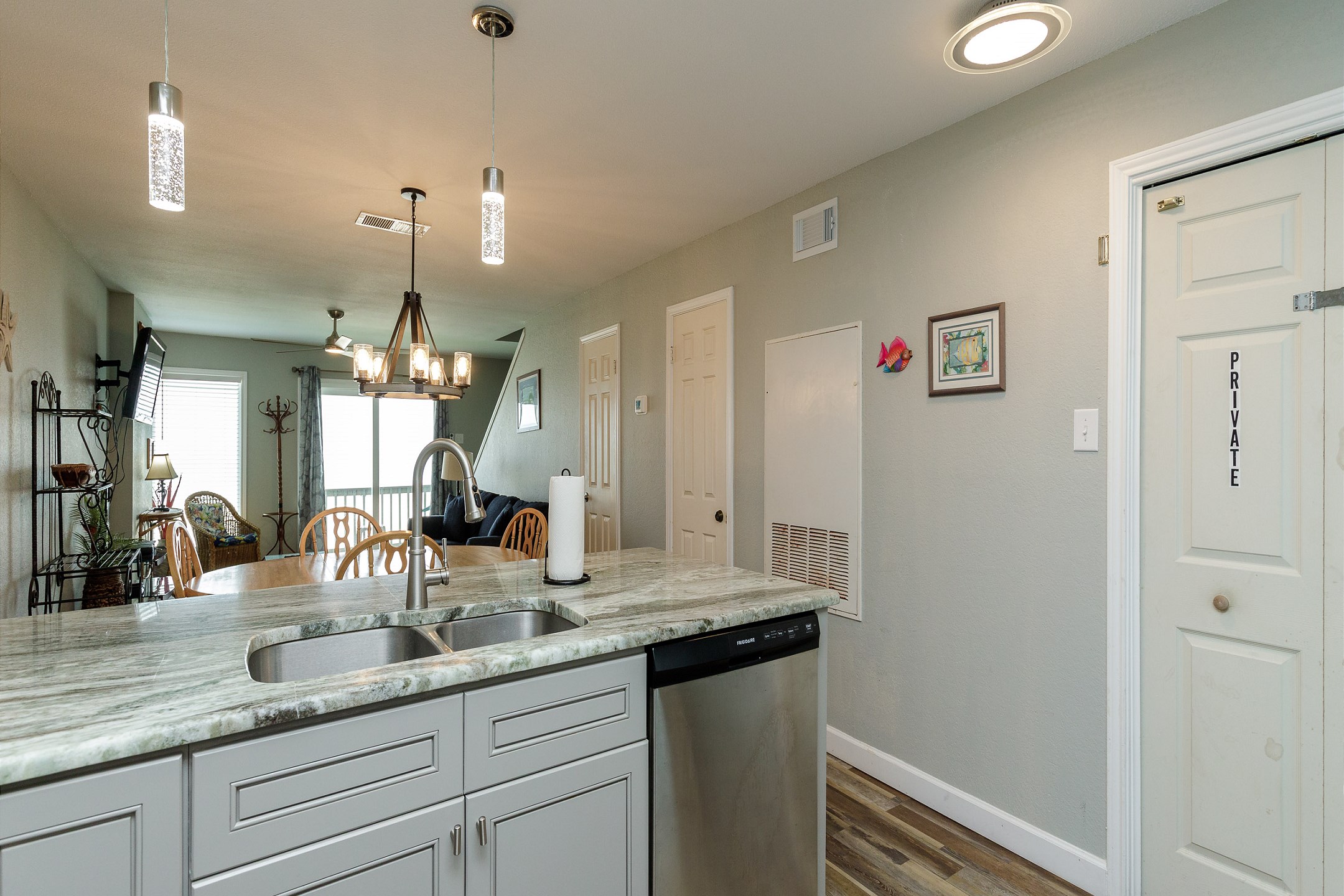 Open layout connecting the kitchen to the dining and living areas
