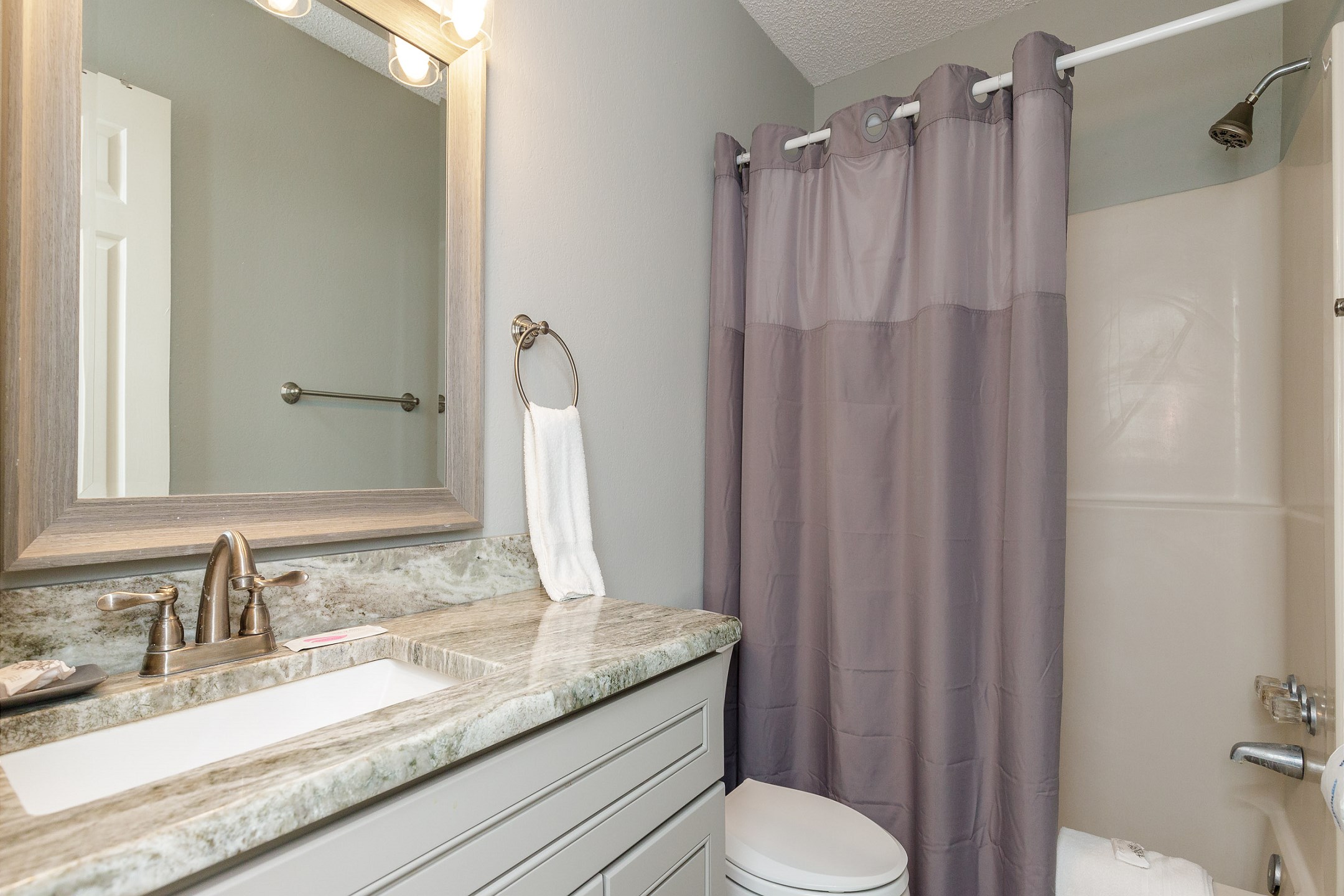 Master bathroom with tub and shower combo