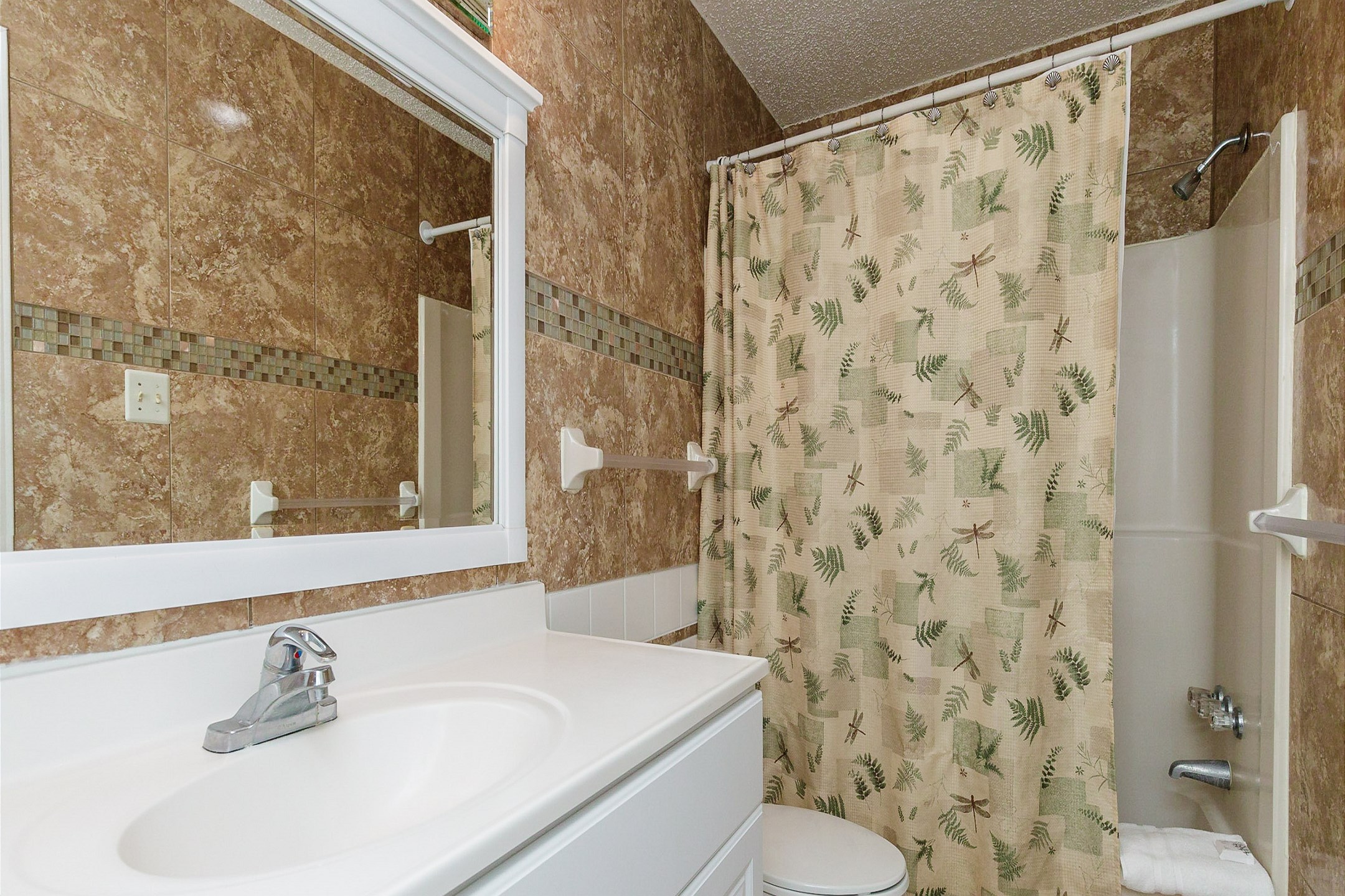 Guest bathroom with tub and shower 