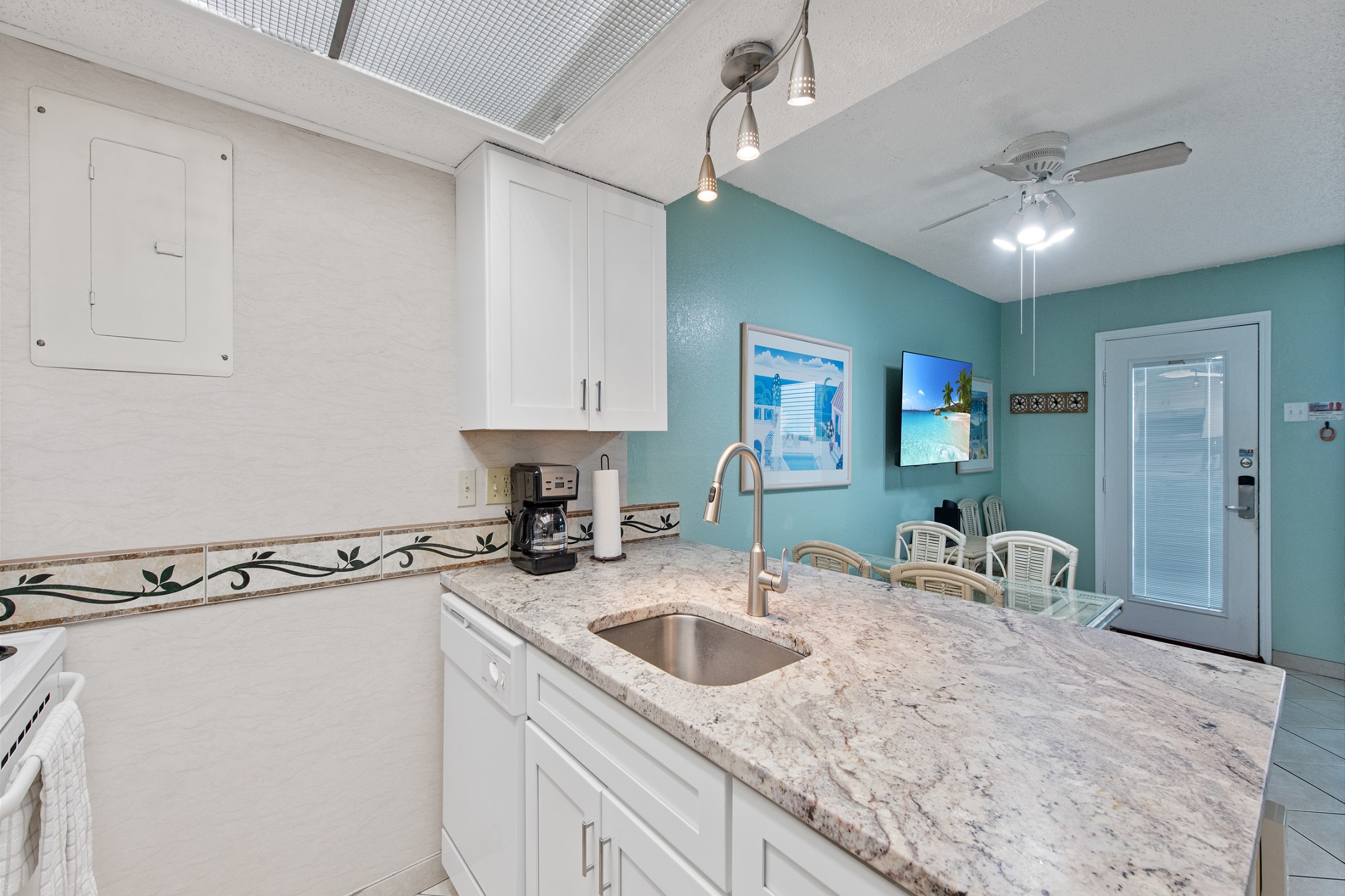Remodeled kitchen area perfect for delightful meal preparation during your getaway