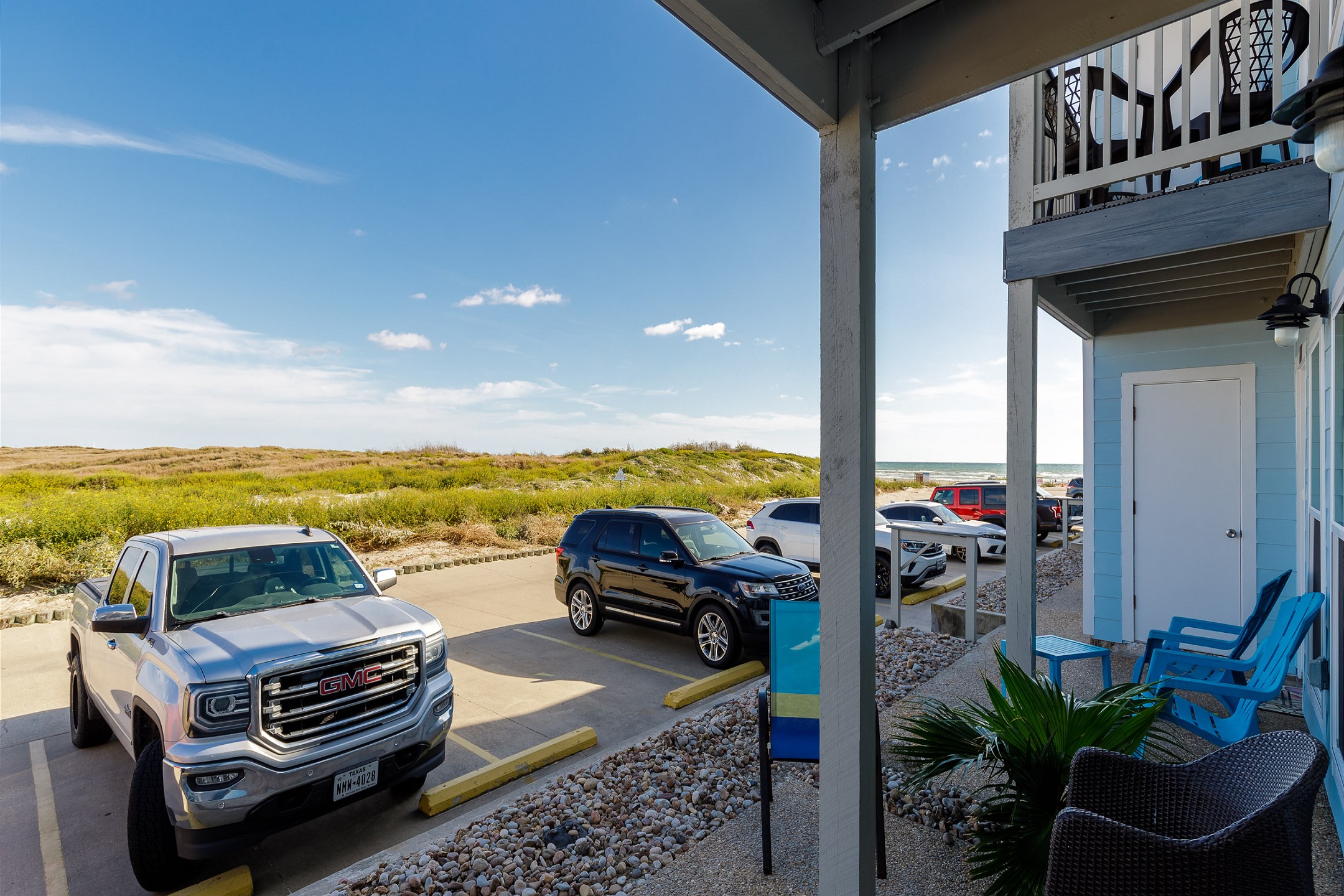 Private patio with stunning views, just steps from the waves